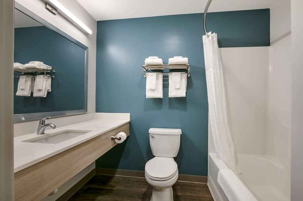 WOODSPRING SUITES KNOXVILLE - CEDAR-guestroom-Guest Room,Bathroom,On-Site.jpg