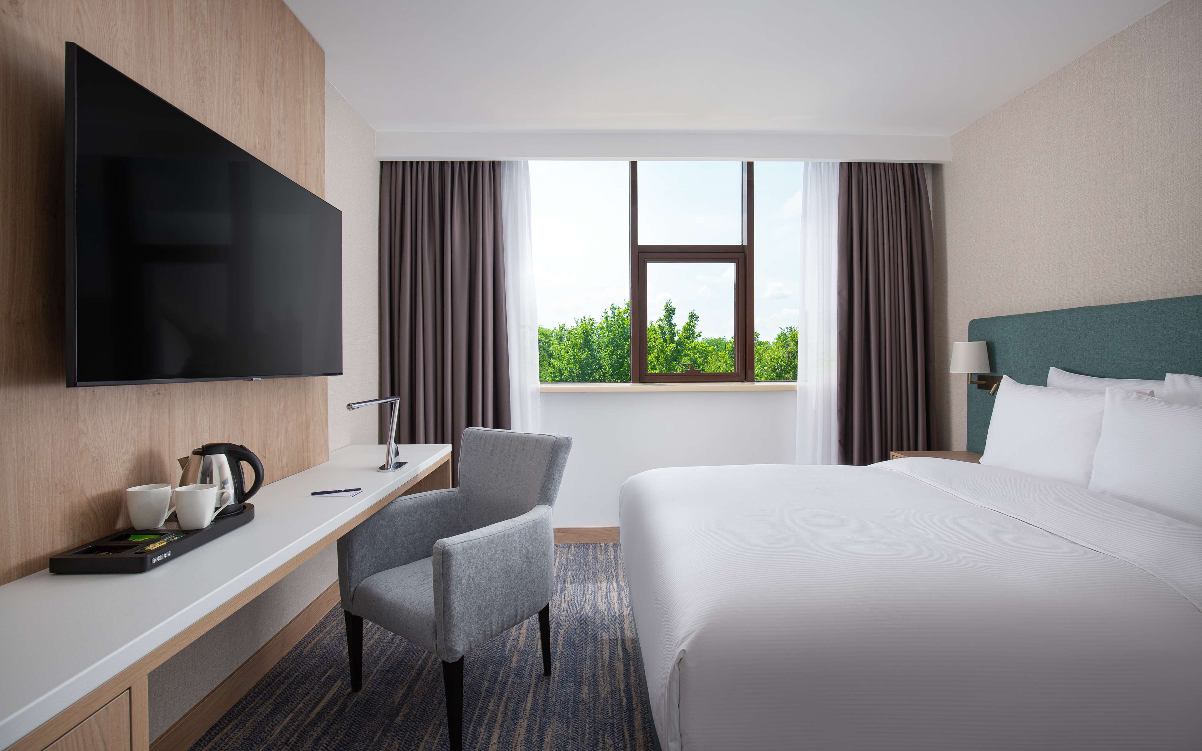 DoubleTree by Hilton Shymkent - Tap to explore photos