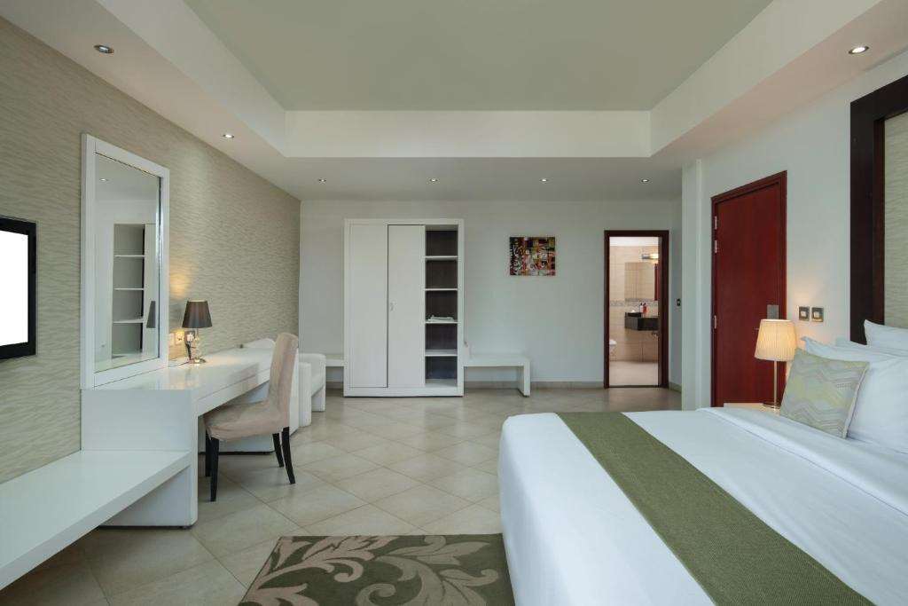 PENINSULA HOTEL DAR ES SALAAM-guestroom-Guest Room,On-Site.jpg