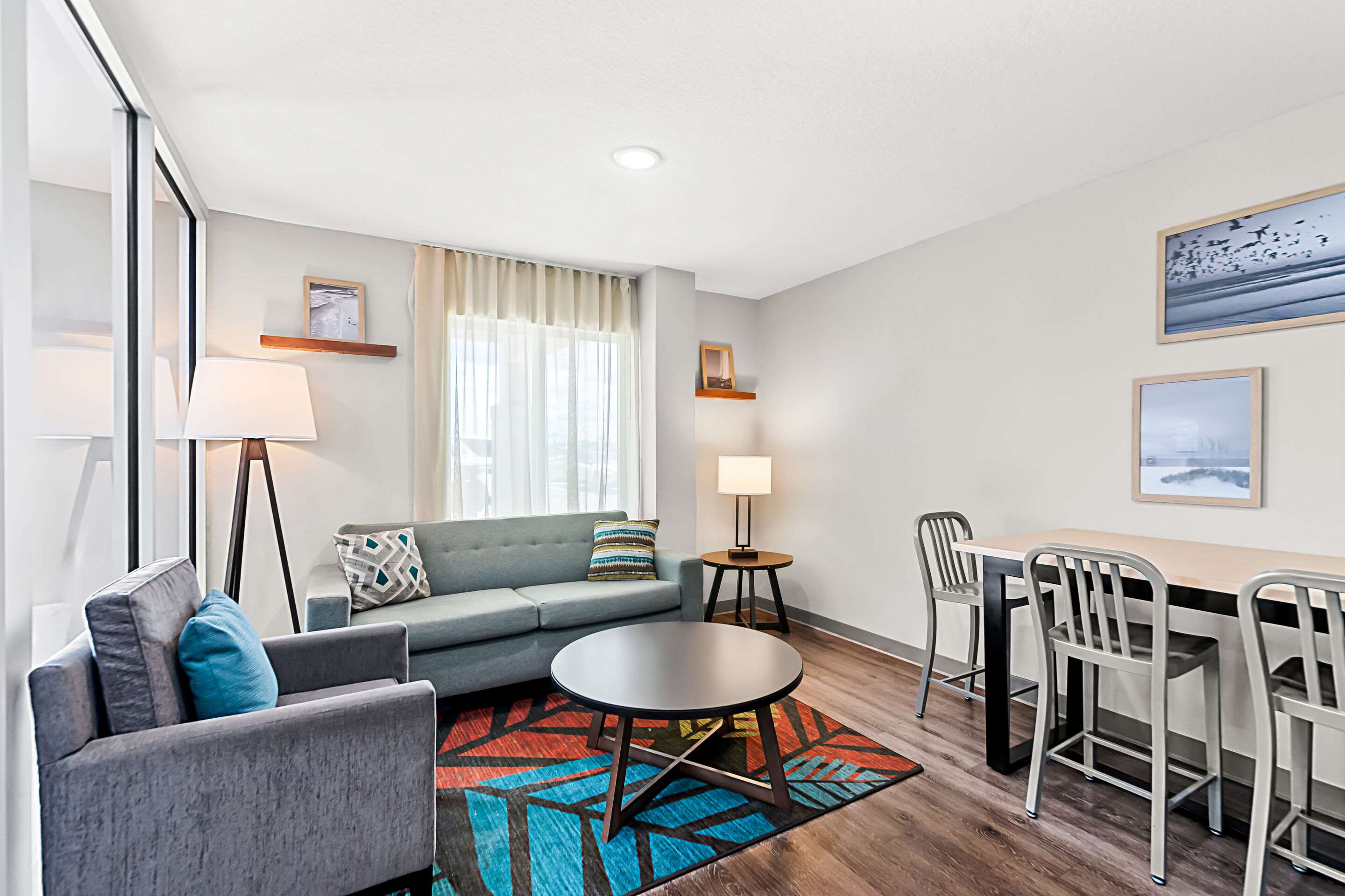 Lobby with sitting area | WoodSpring Suites Hudson Port Richey