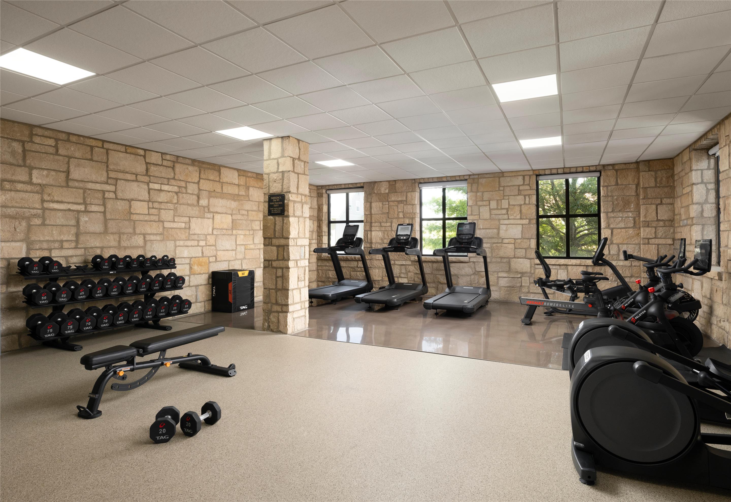 Health club fitness center gym | The Oread Lawrence, Tapestry Collection by Hilton