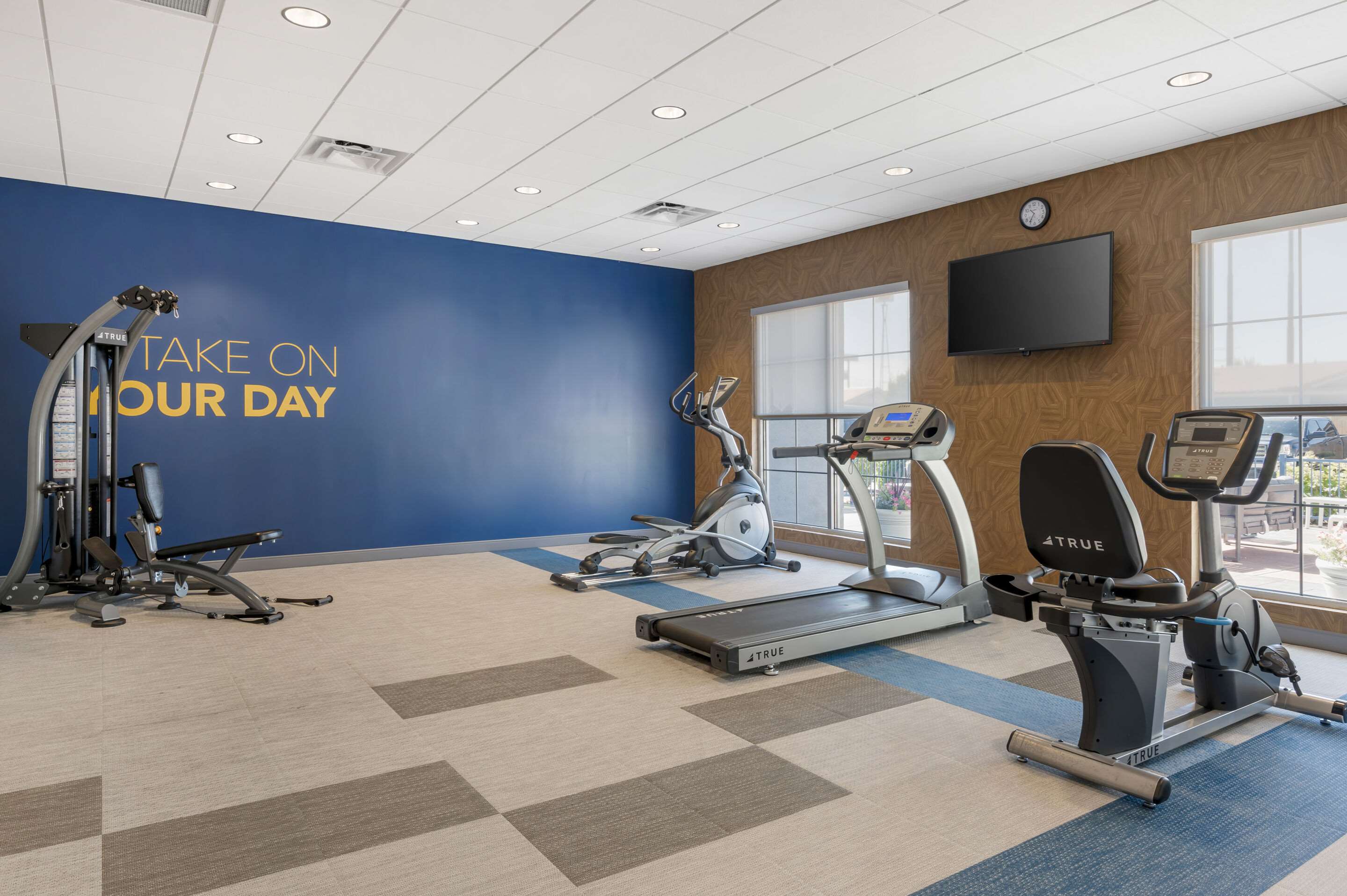 Exercise room with cardio equipment | Comfort Suites