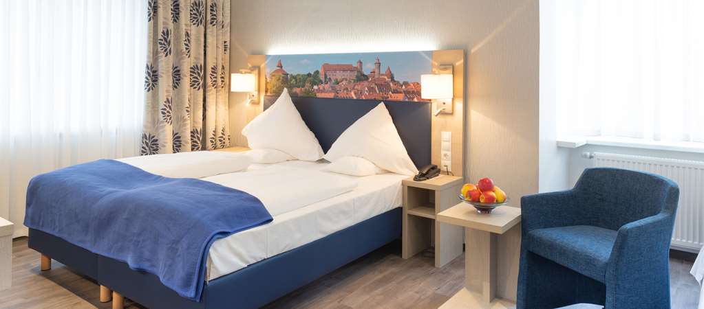 Ringhotel Loews Merkur-guestroom-Guest Room,On-Site.jpg