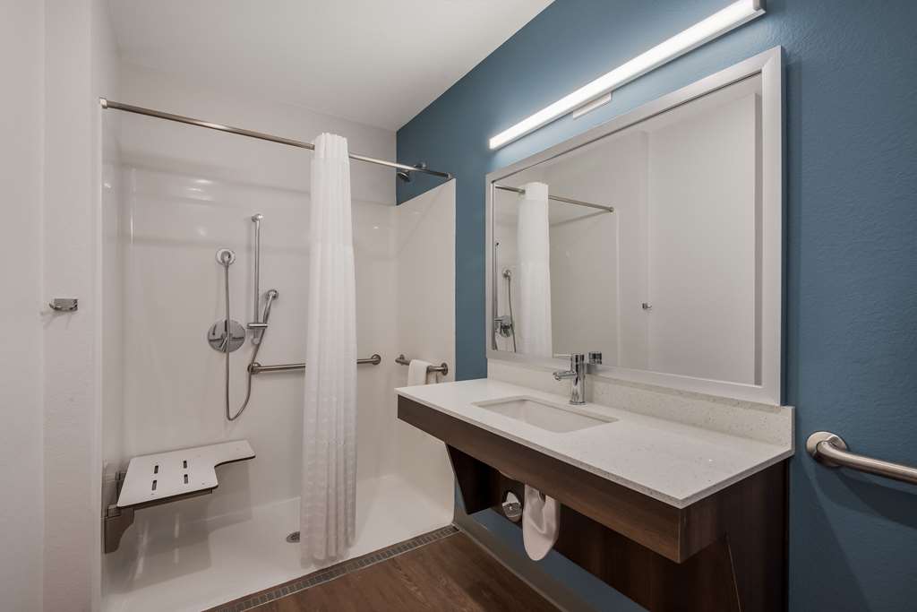 WOODSPRING SUITES BELLFLOWER - LOS-guestroom-Guest Room,Bathroom,On-Site.jpg