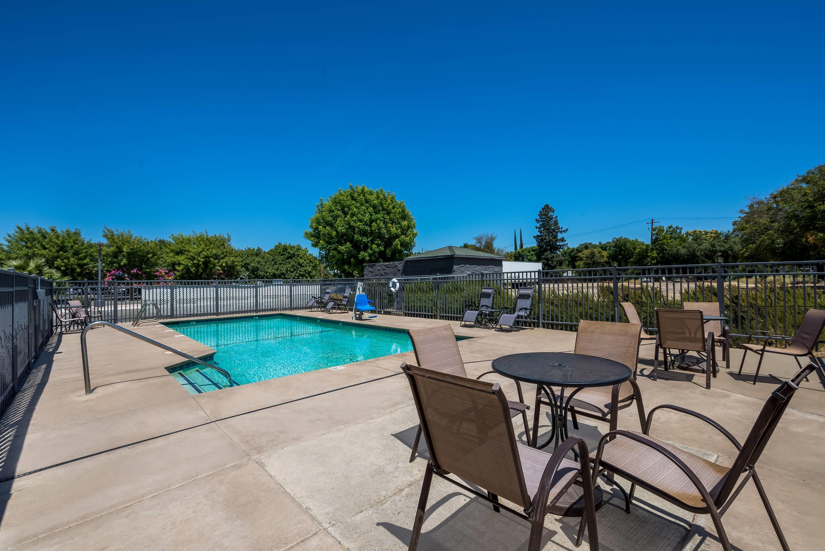 Relax by the pool | Quality Inn Yuba City/Marysville