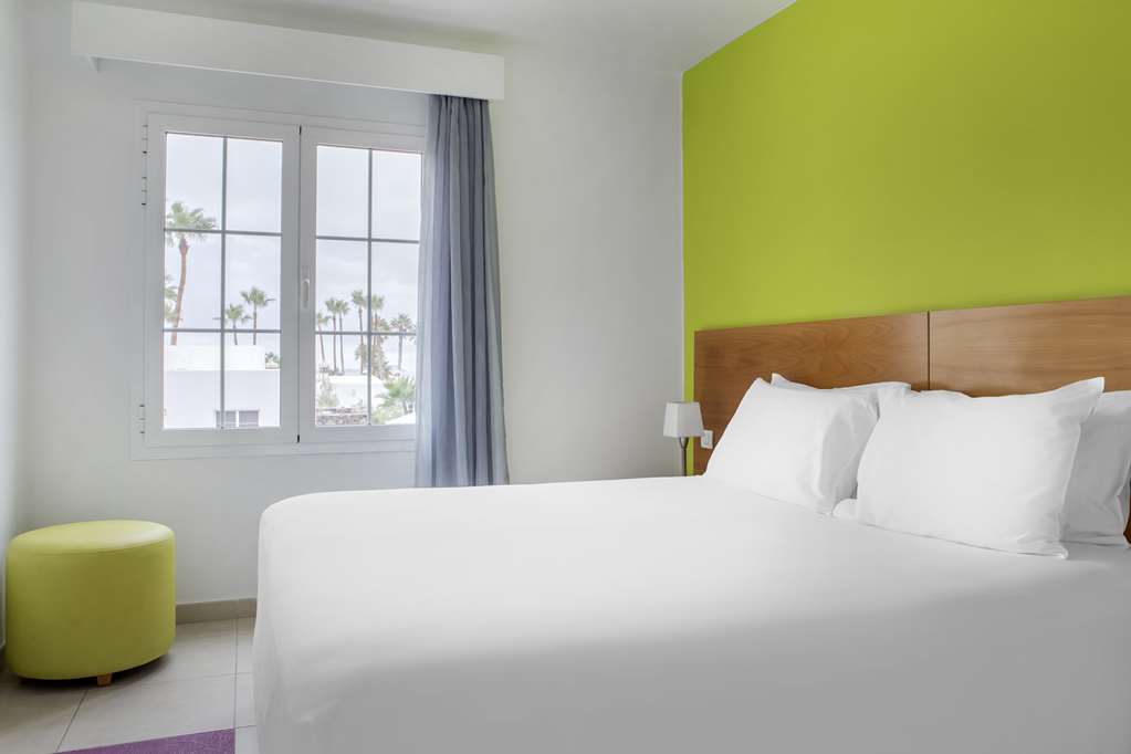 JARDINES DEL SOL-guestroom-Guest Room,On-Site.jpg
