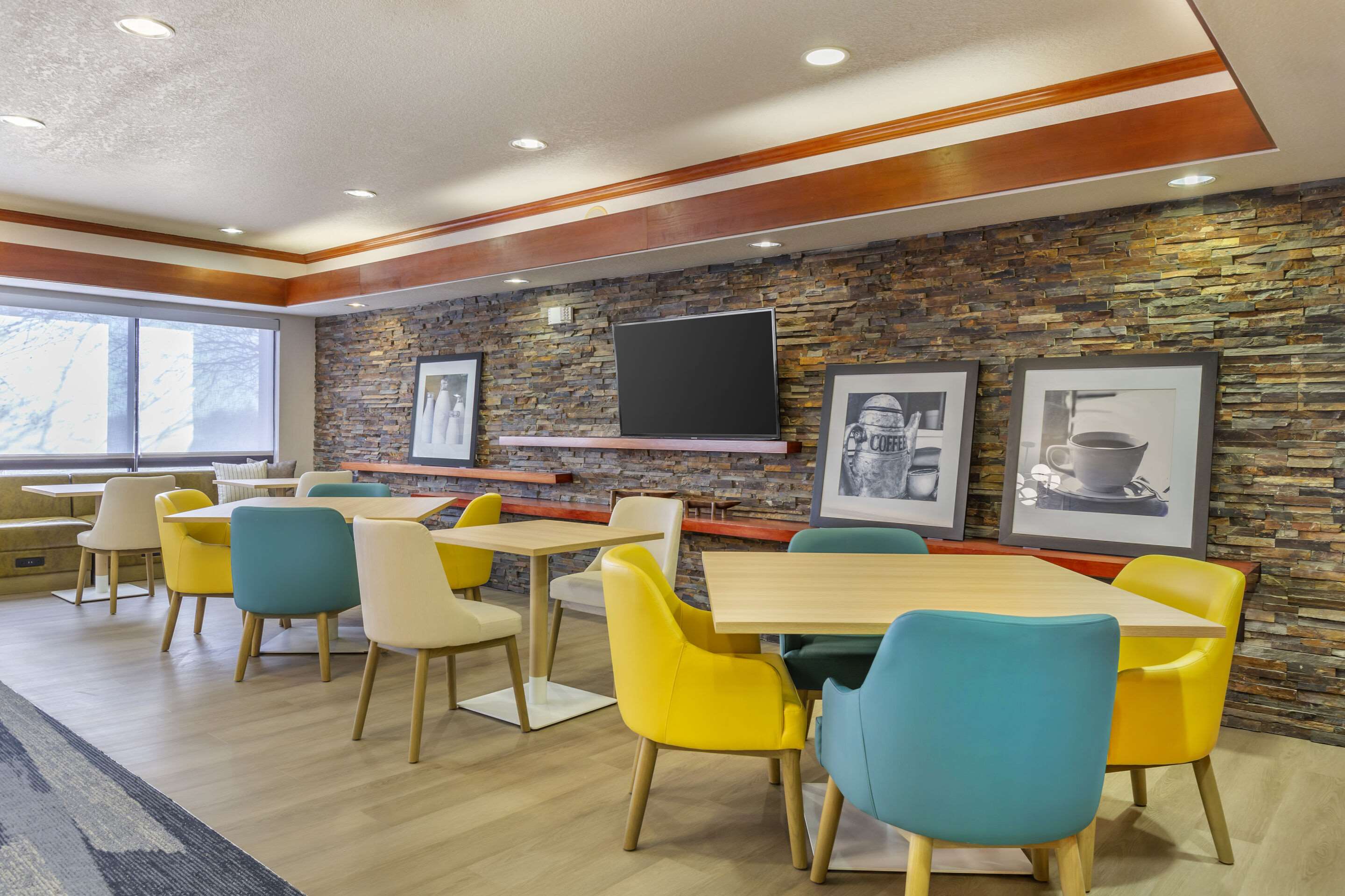Enjoy breakfast in this seating area | Comfort Inn & Suites Rapid City near Mt. Rushmore