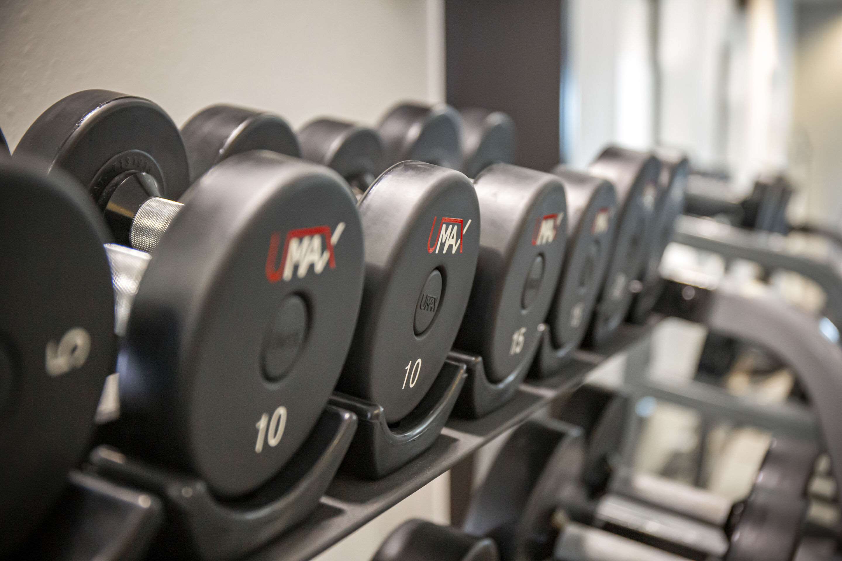 Exercise room with cardio equipment and weights | Comfort Inn & Suites Rapid City near Mt. Rushmore