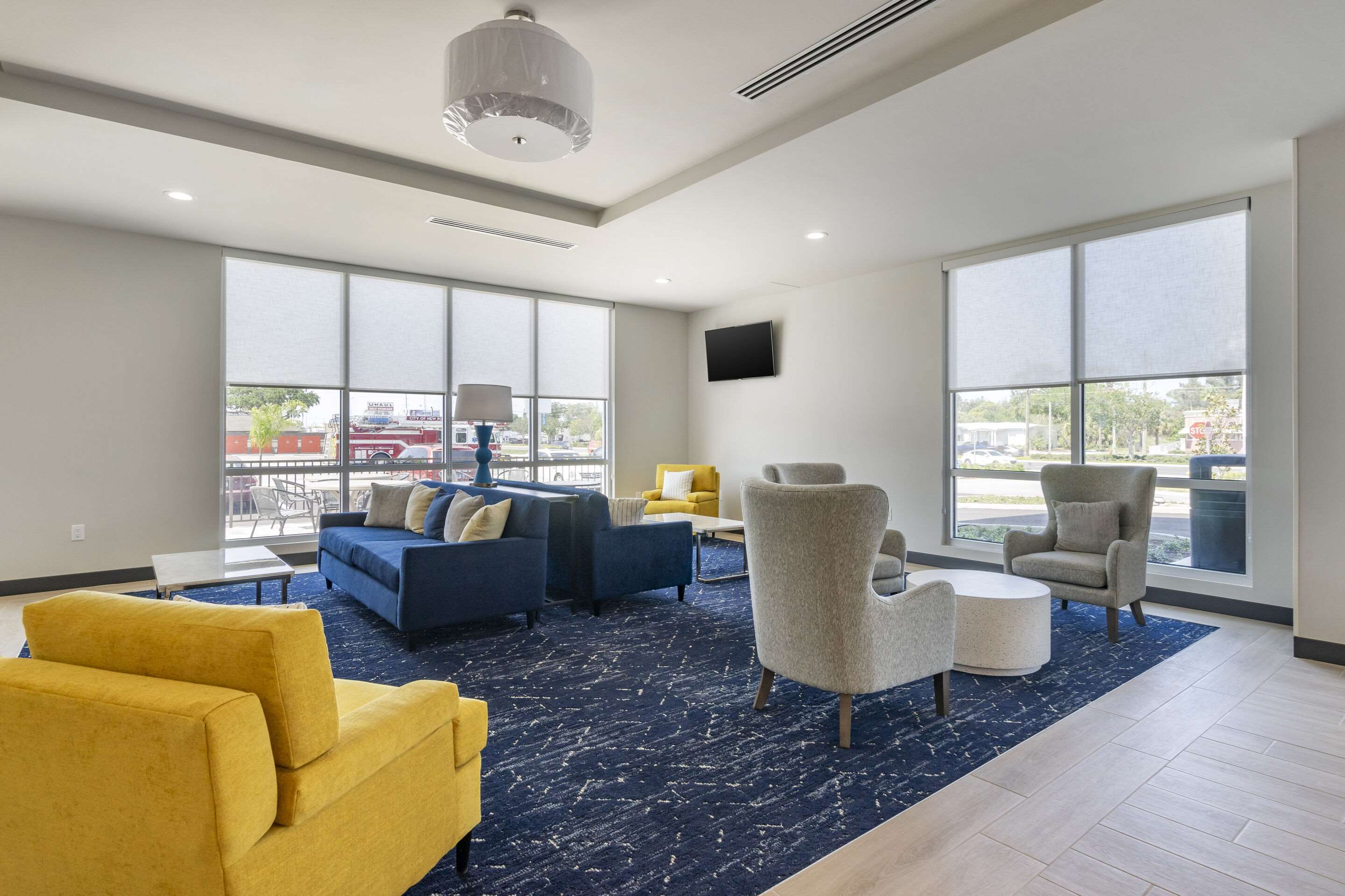 Lobby with sitting area | Comfort Inn & Suites New Port Richey Downtown District