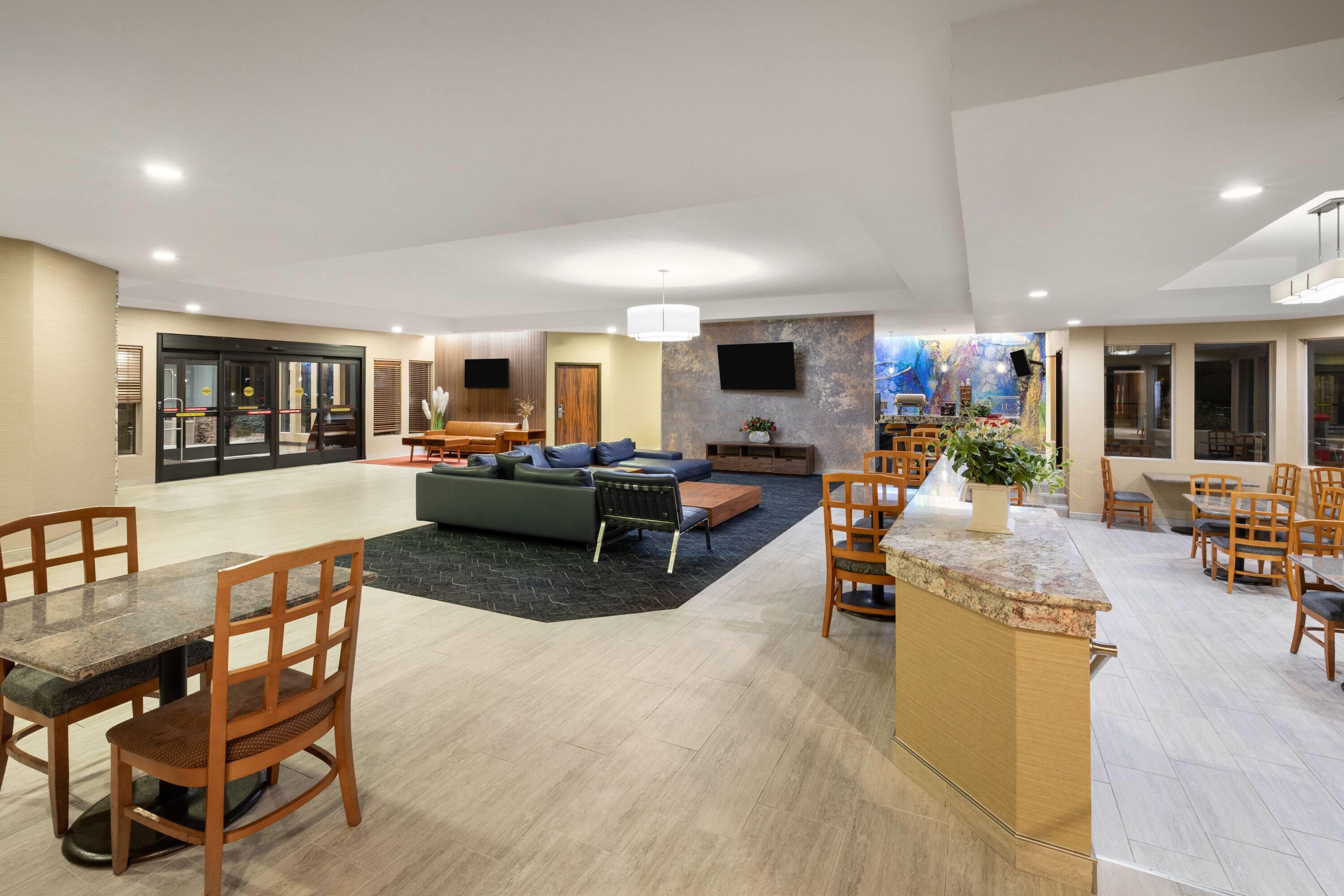 Lobby | Endeavor Inn & Suites, Trademark Collection by Wyndham
