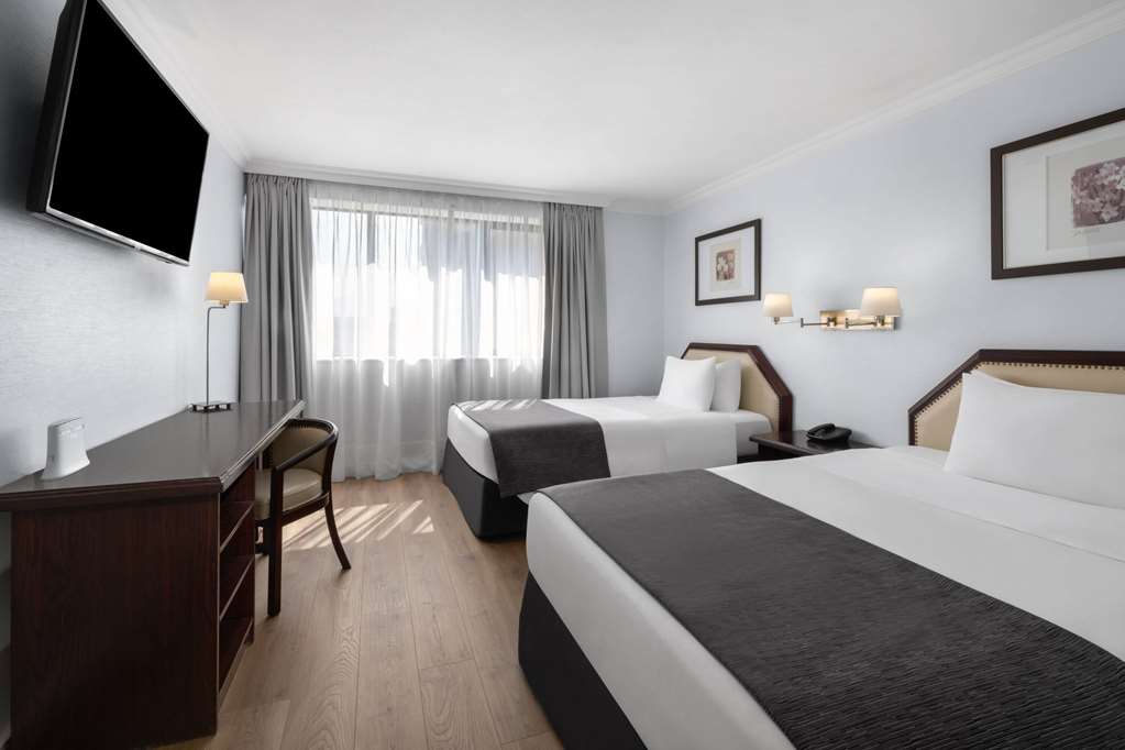 WYNDHAM GARDEN SANTIAGO KENNEDY-guestroom-Guest Room,On-Site.jpg