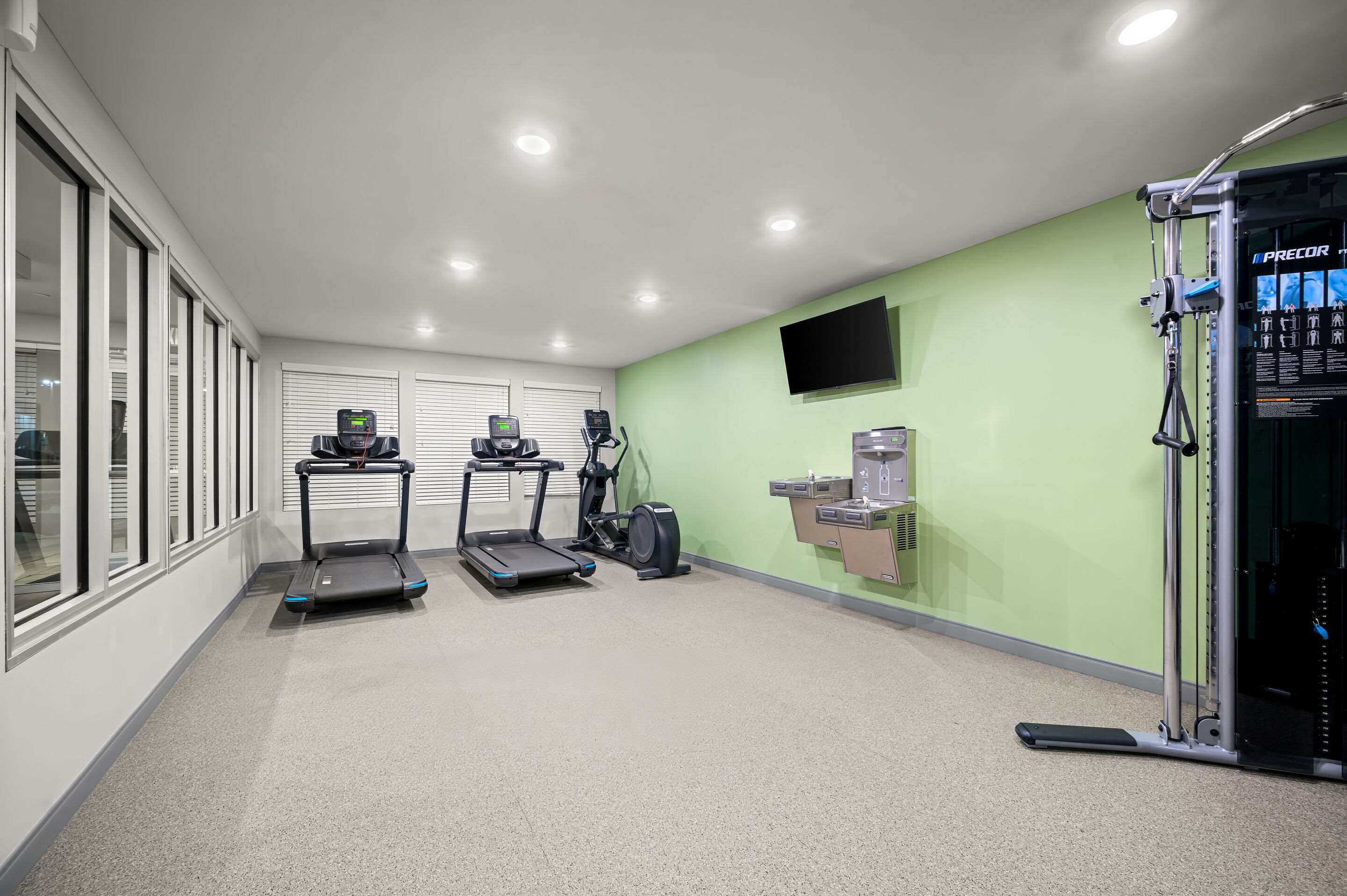 Exercise room | Woodspring Suites Dearborn - Detroit