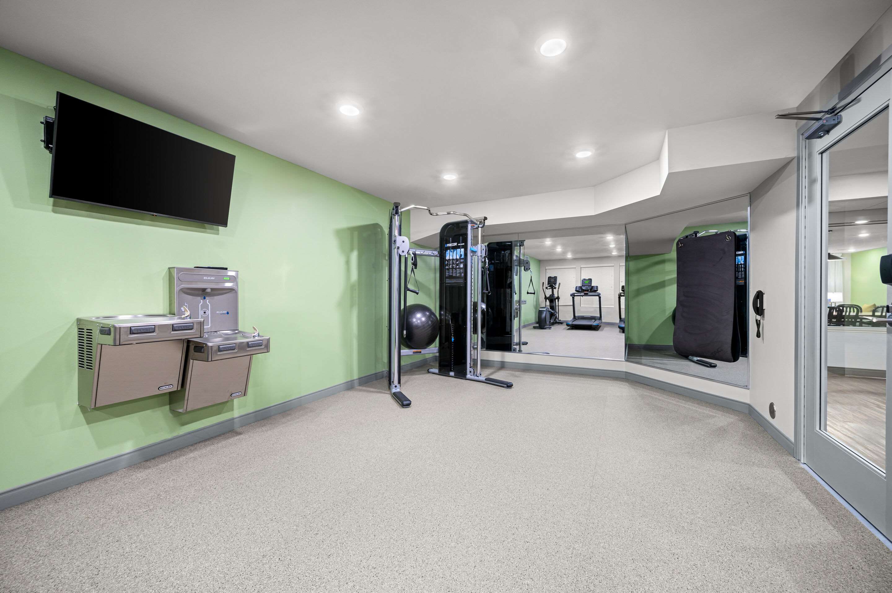 Exercise room | Woodspring Suites Dearborn - Detroit