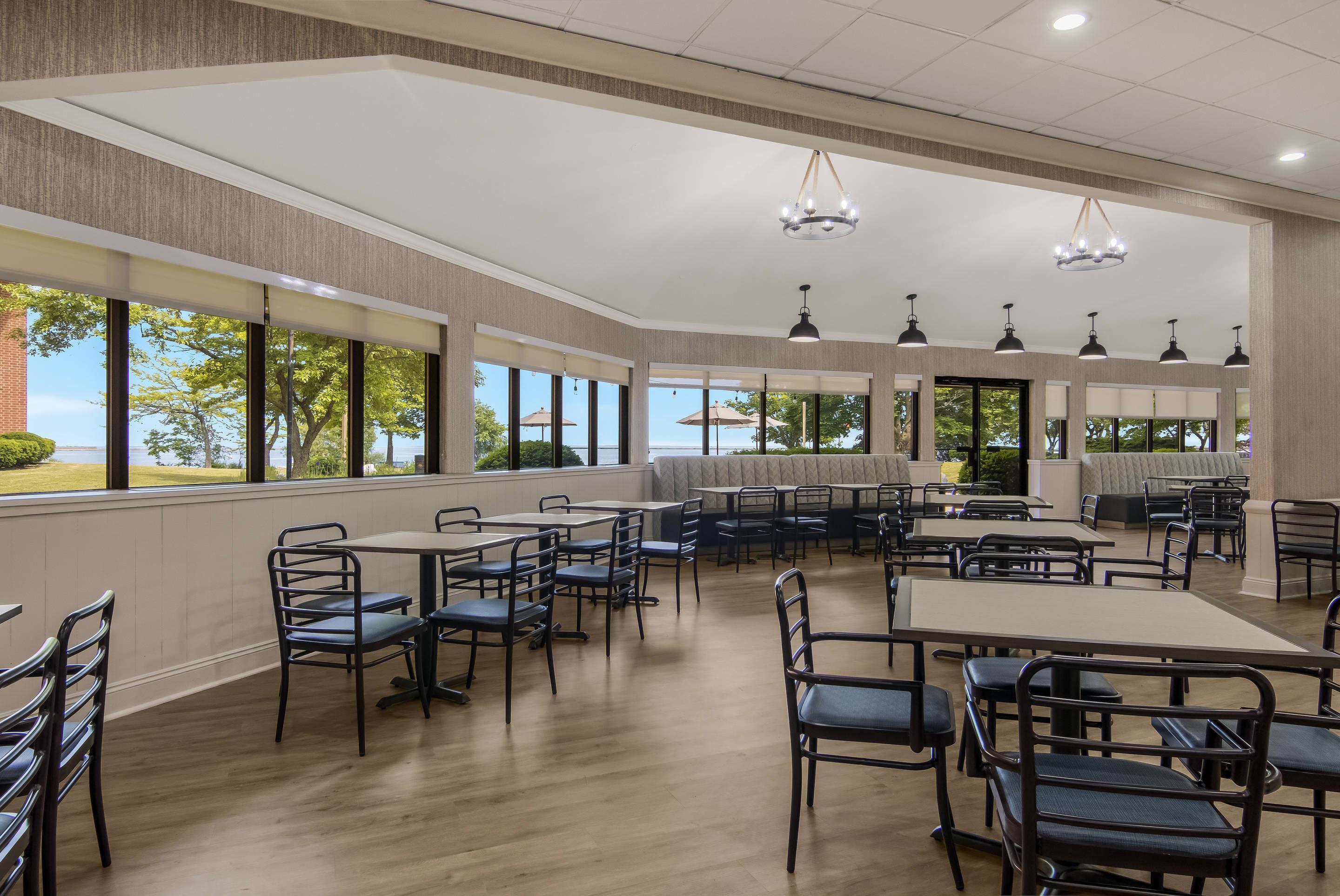 Enjoy breakfast in this seating area | The Inn on Maritime Bay, Ascend Hotel Collection