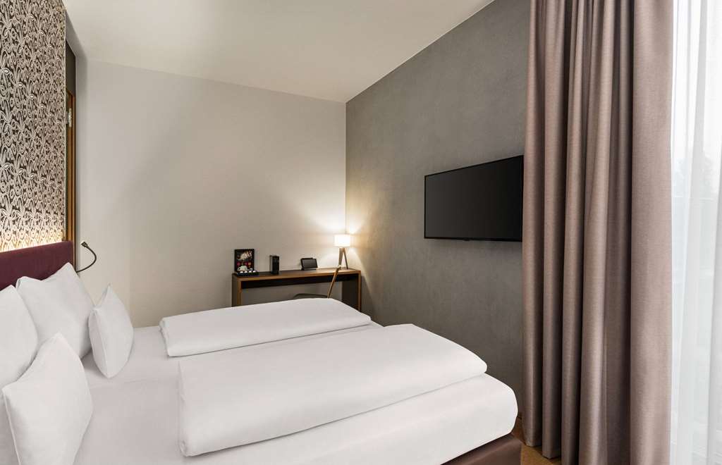 AMEDIA LUSTENAU, TRADEMARK COLLECTI-guestroom-Guest Room,On-Site.jpg