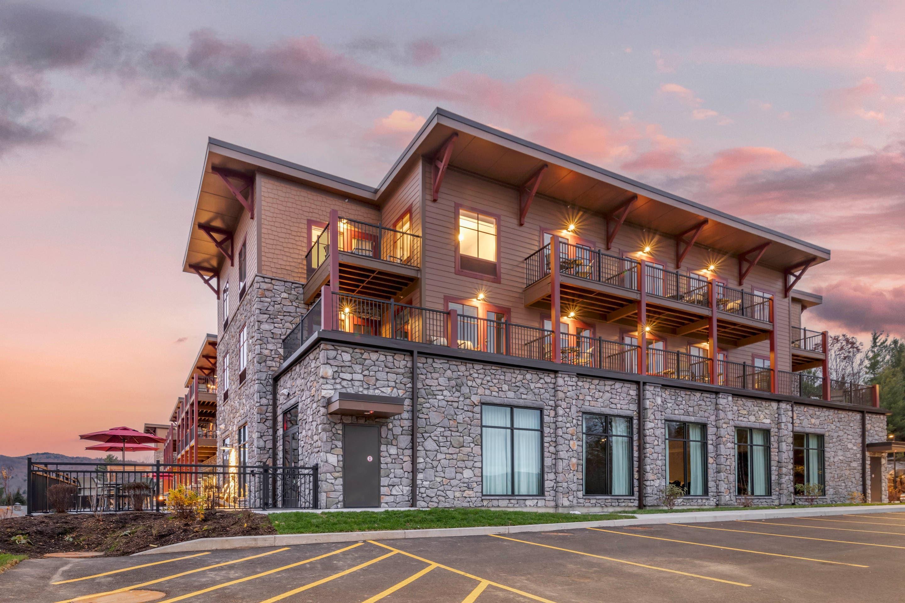 Hotel at twilight | Cambria Hotel Lake Placid - Lakeside Resort