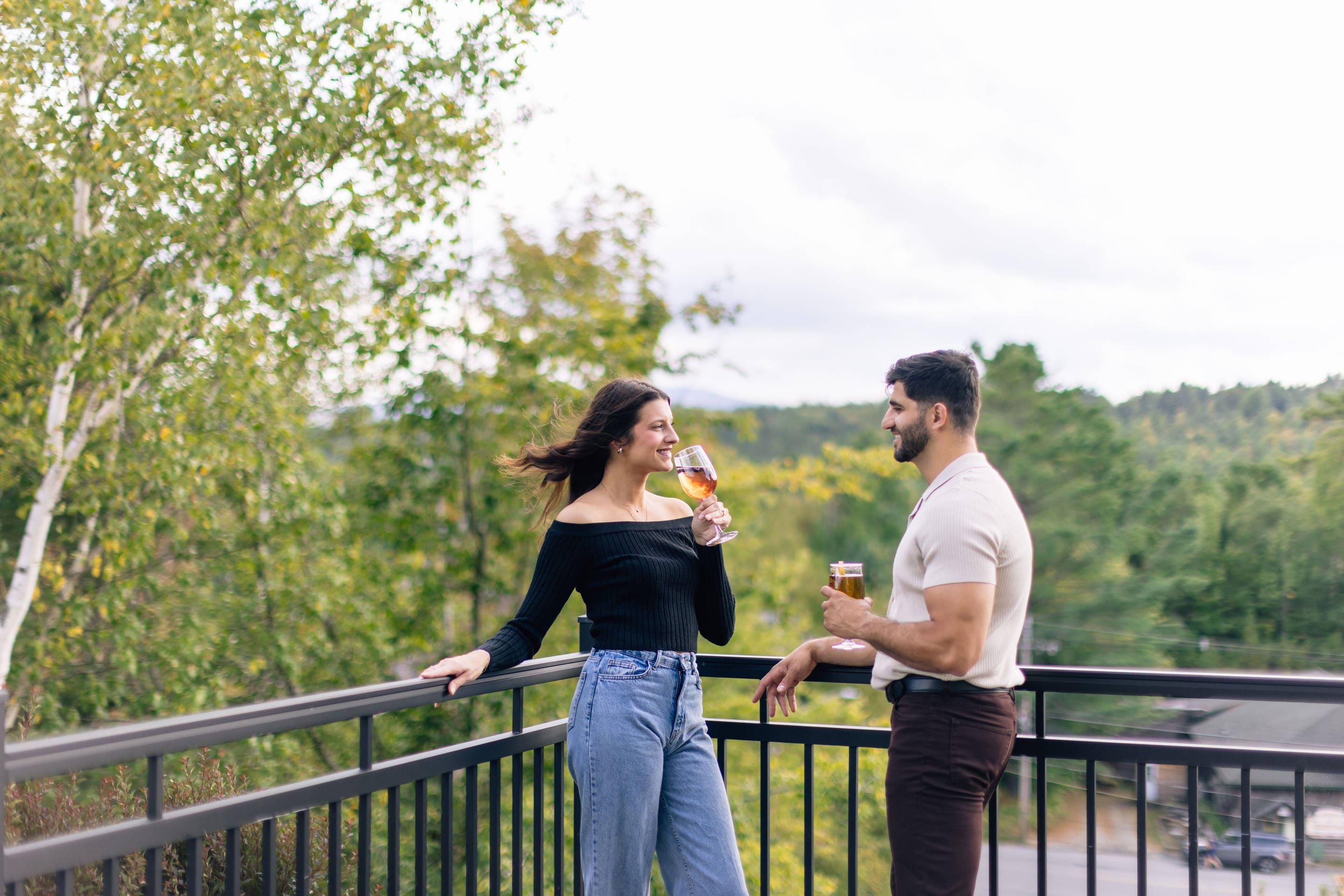 Grab a drink on our outdoor deck | Cambria Hotel Lake Placid - Lakeside Resort
