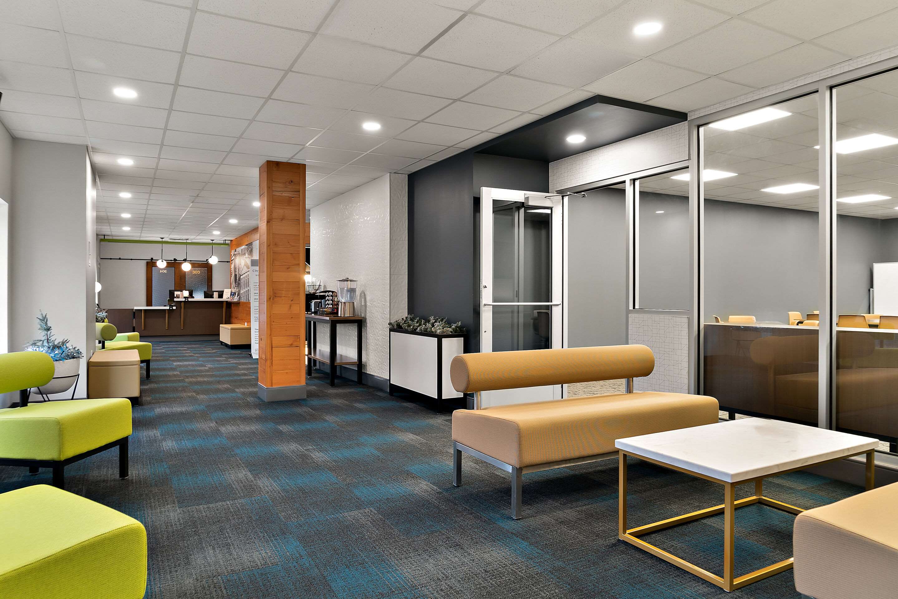 Spacious lobby with sitting area | Cityflatshotel - Port Huron, Ascend Hotel Collection