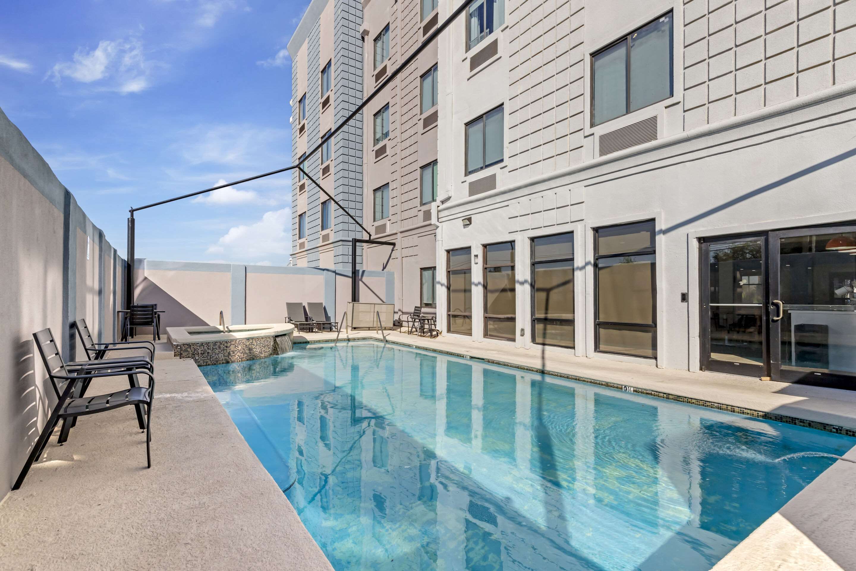 Outdoor pool | Amerik Suites Laredo at Mall Del Norte
