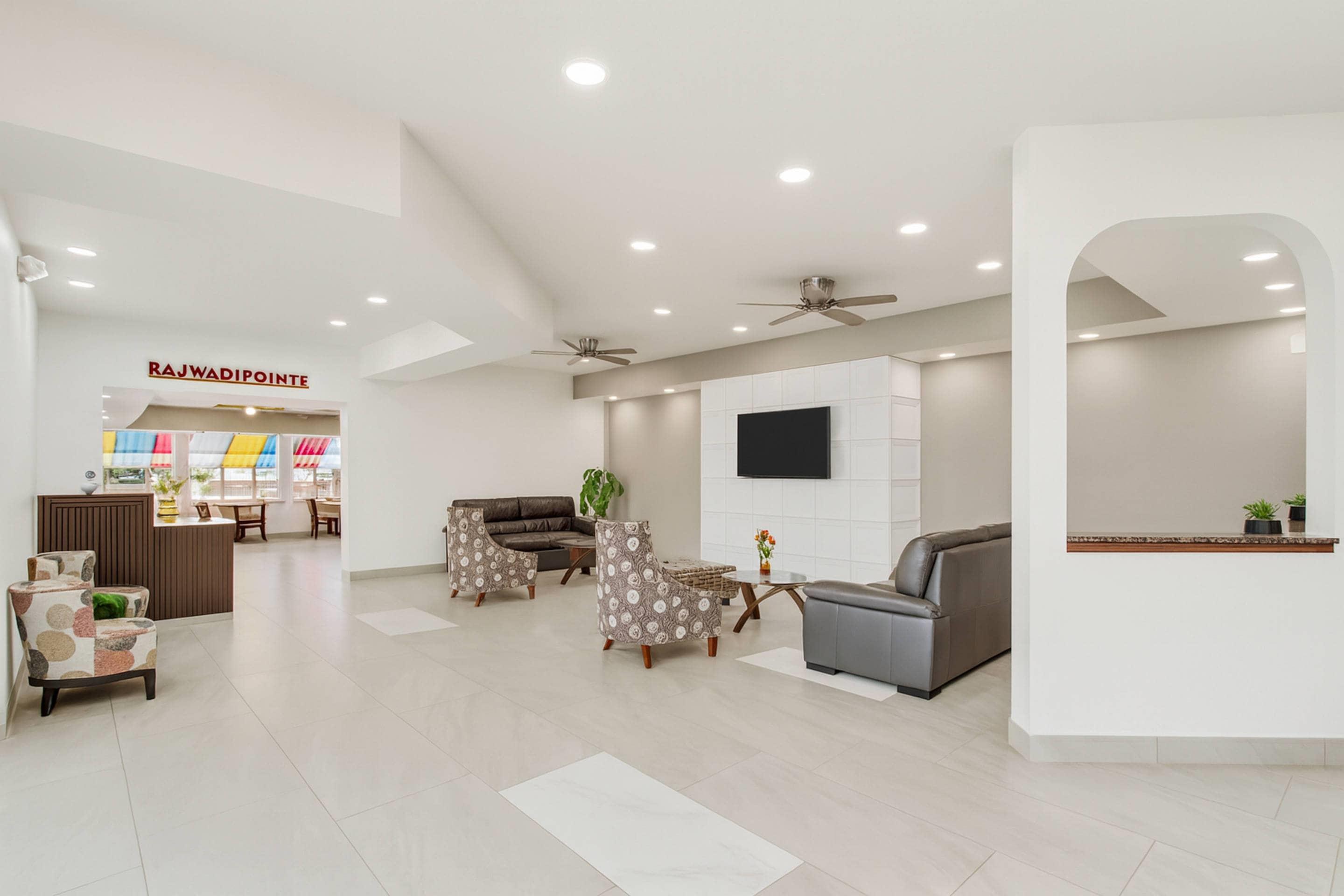 Lobby with sitting area | Suburban Studios Salt Lake City Airport