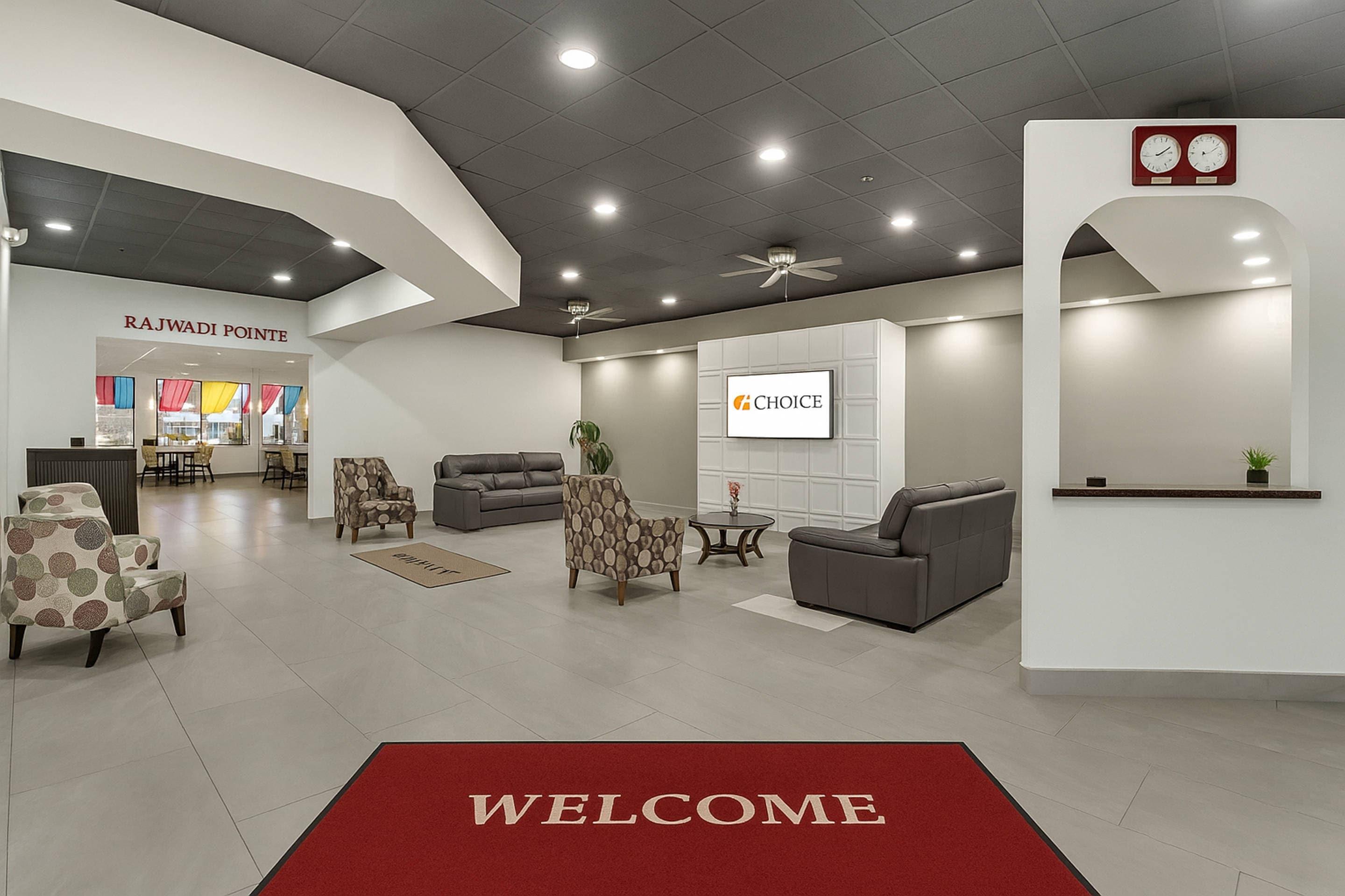 Lobby with sitting area | Suburban Studios Salt Lake City Airport