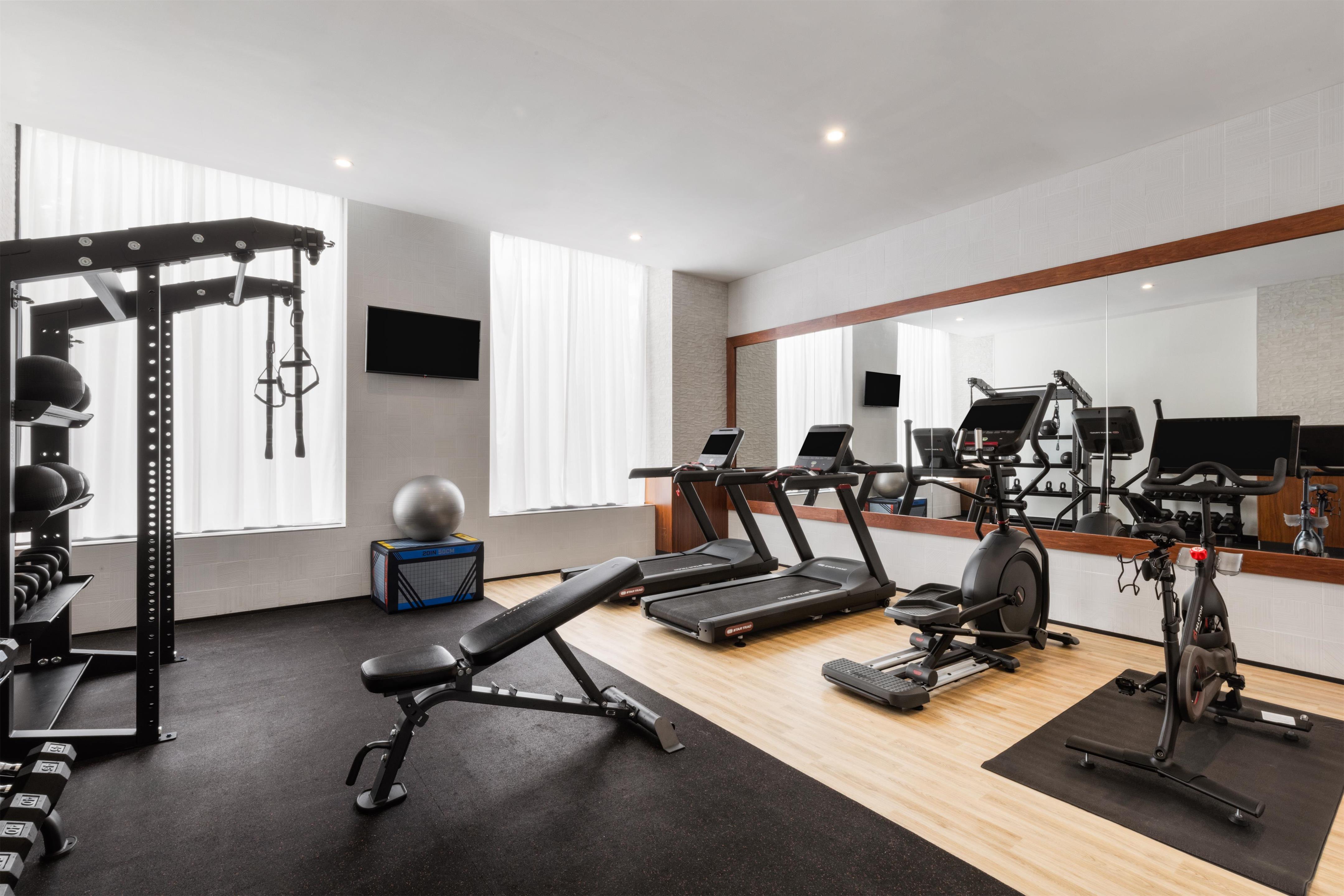 Health club fitness center gym | DoubleTree by Hilton Long Island City, NY