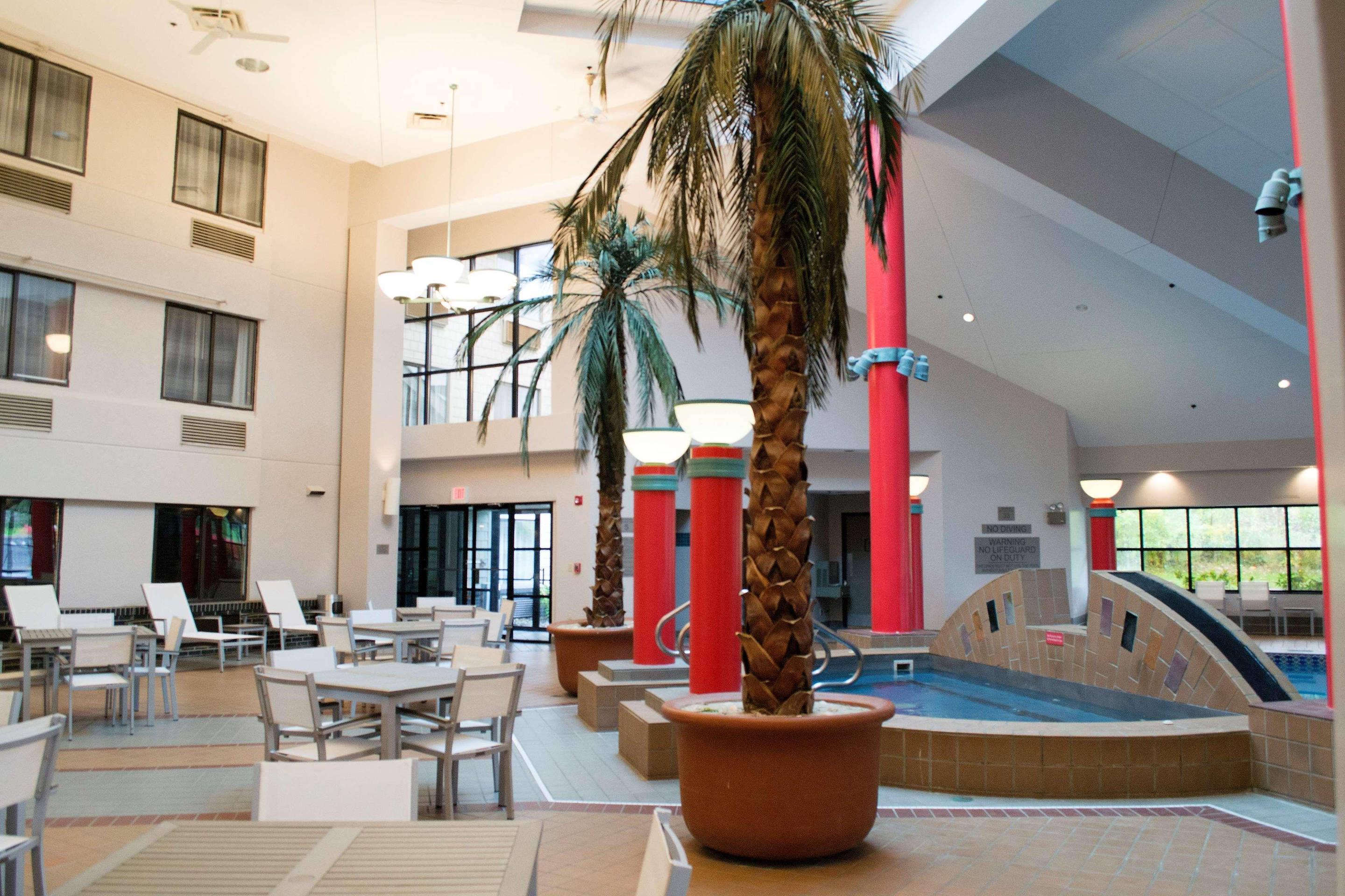 Hot Tub and PoolCourtyard Area | Country Inn & Suites by Radisson Erie