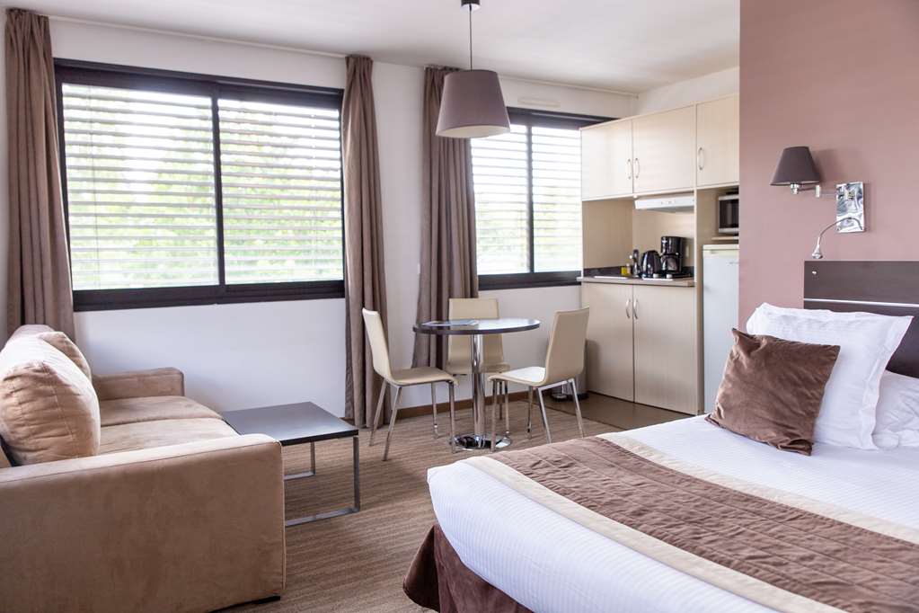 ZENITUDE HOTEL RESIDENCES FERNEY VO-guestroom-Guest Room,Suite,On-Site.jpg
