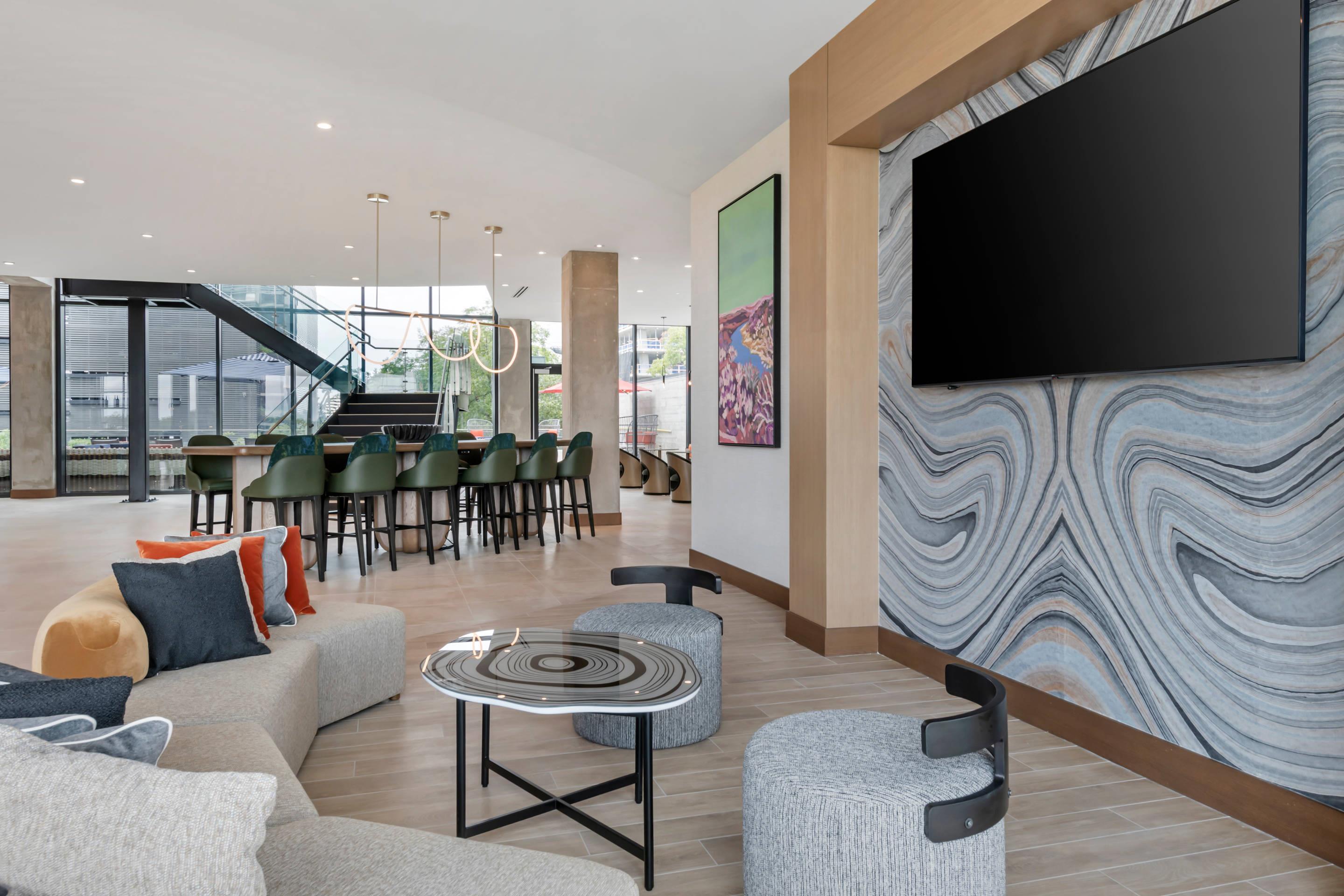 Lobby with sitting area | Cambria Hotel Austin Downtown