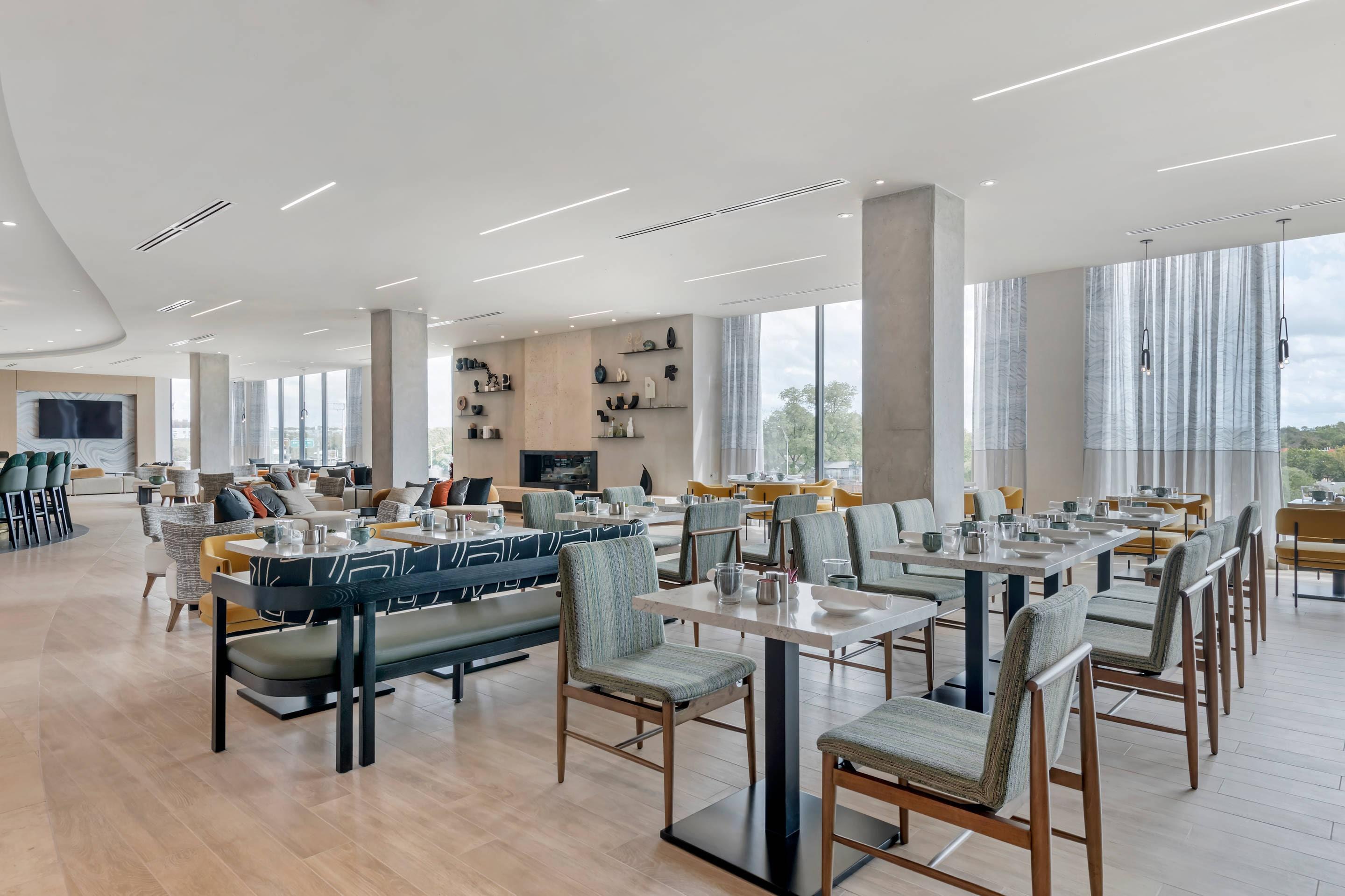 Enjoy breakfast in this seating area | Cambria Hotel Austin Downtown