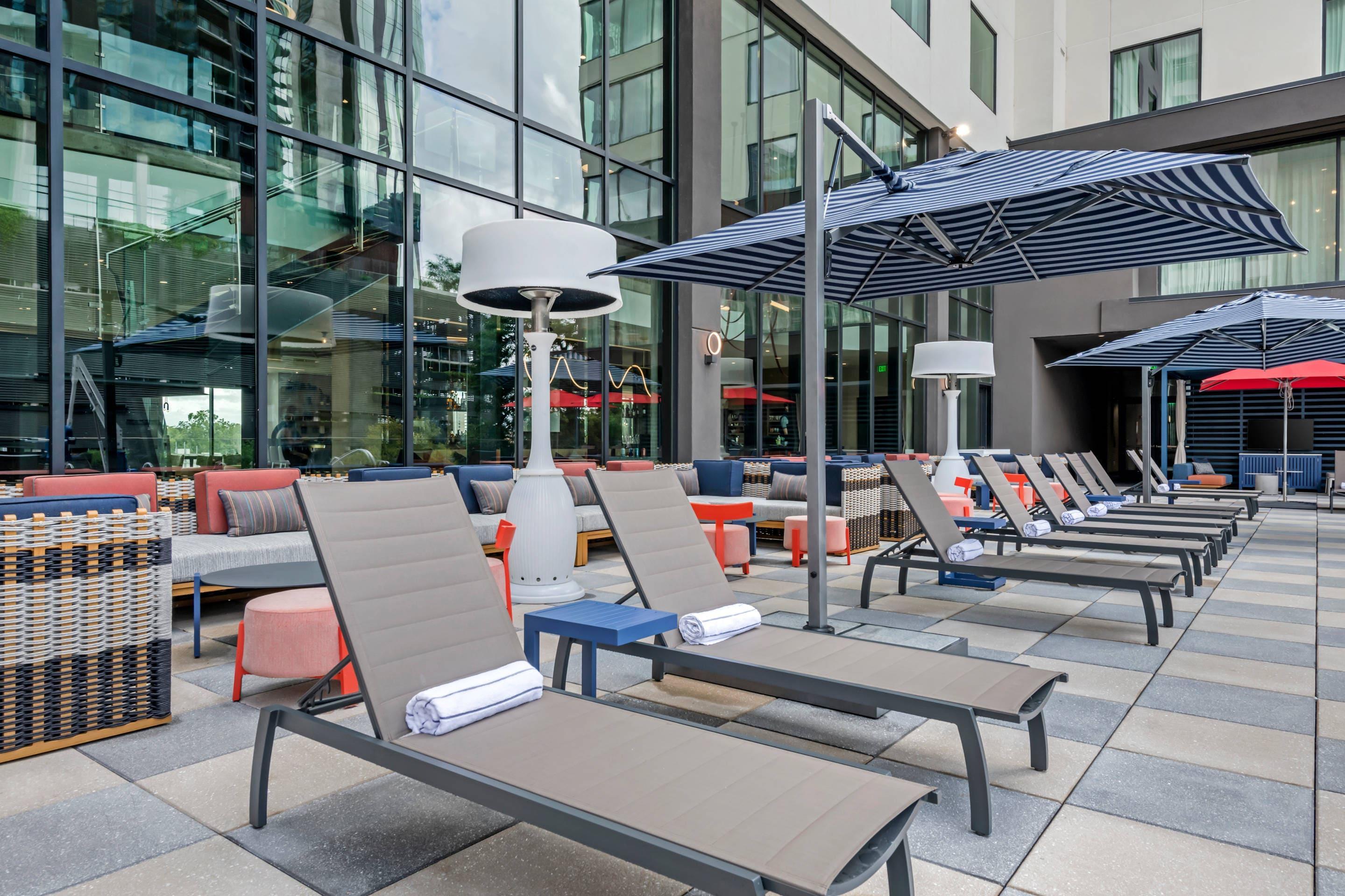 Relax by the pool | Cambria Hotel Austin Downtown