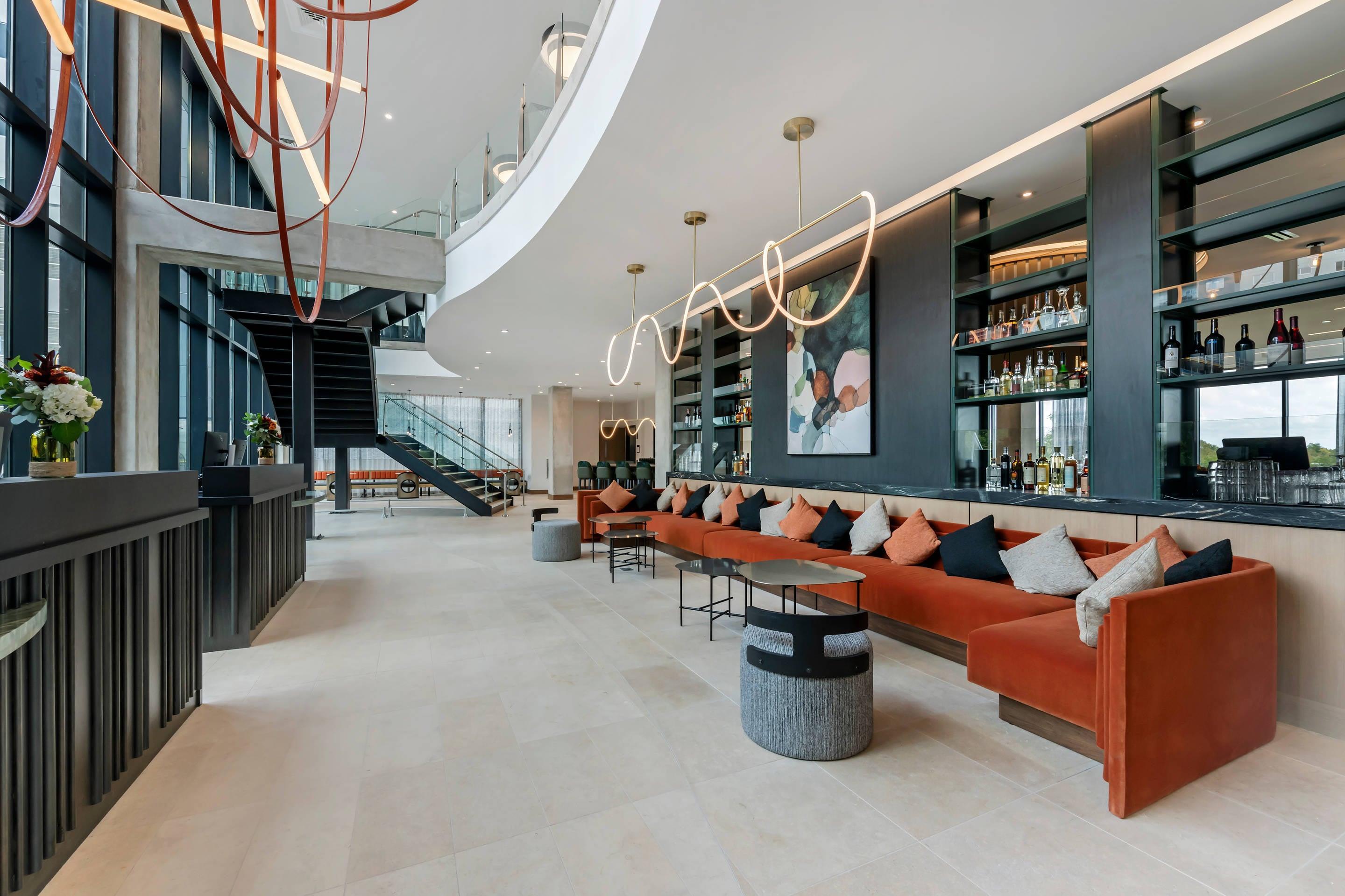 Spacious lobby with sitting area | Cambria Hotel Austin Downtown