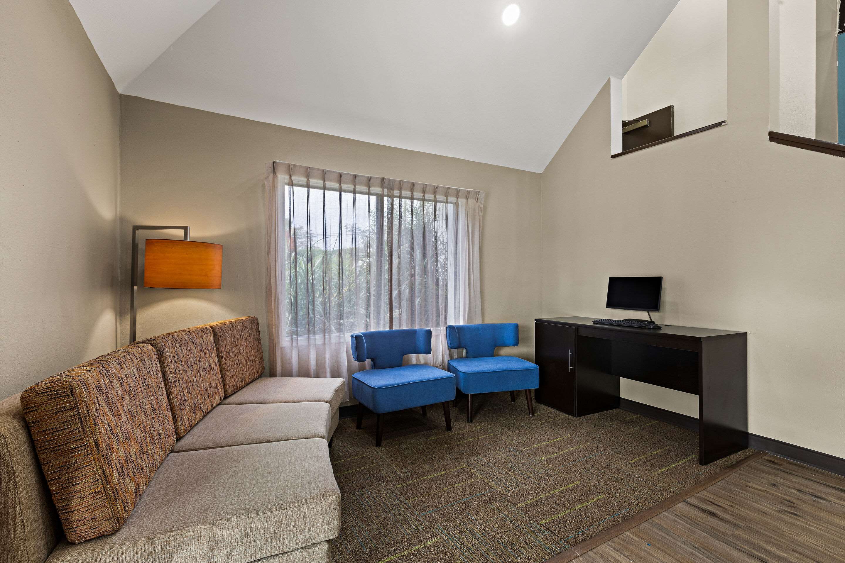 Lobby with sitting area | Sleep Inn