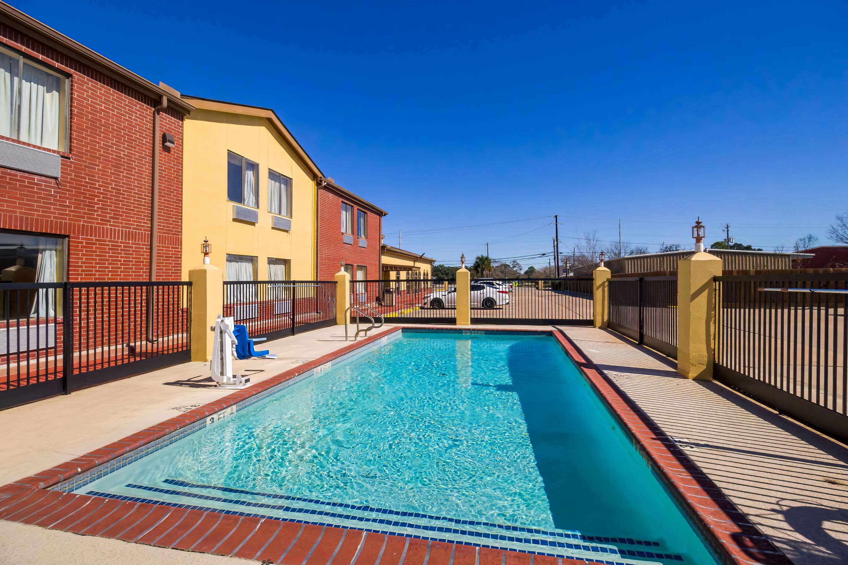 Outdoor pool | Quality Inn Bay City TX