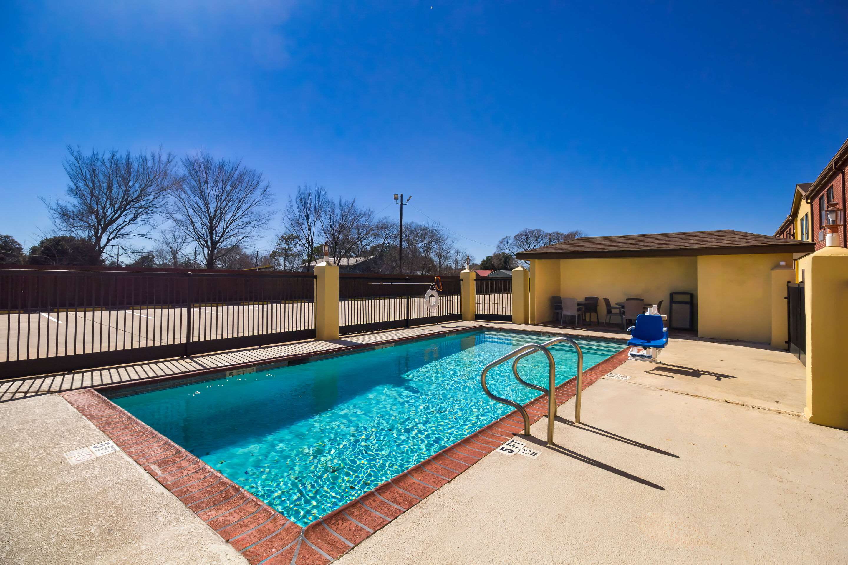 Outdoor pool | Quality Inn Bay City TX
