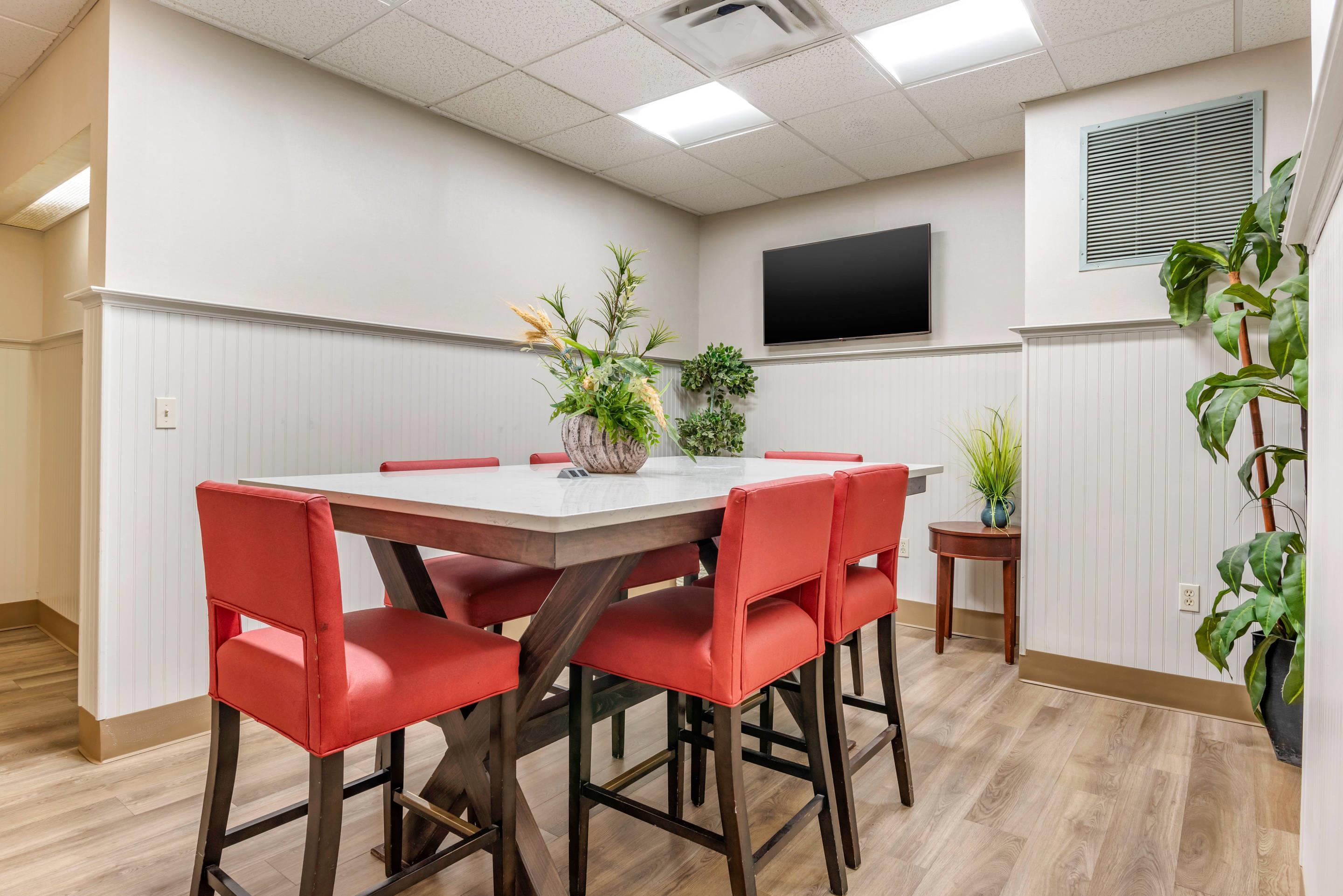 Enjoy breakfast in this seating area | Mainstay Suites Ocean City West