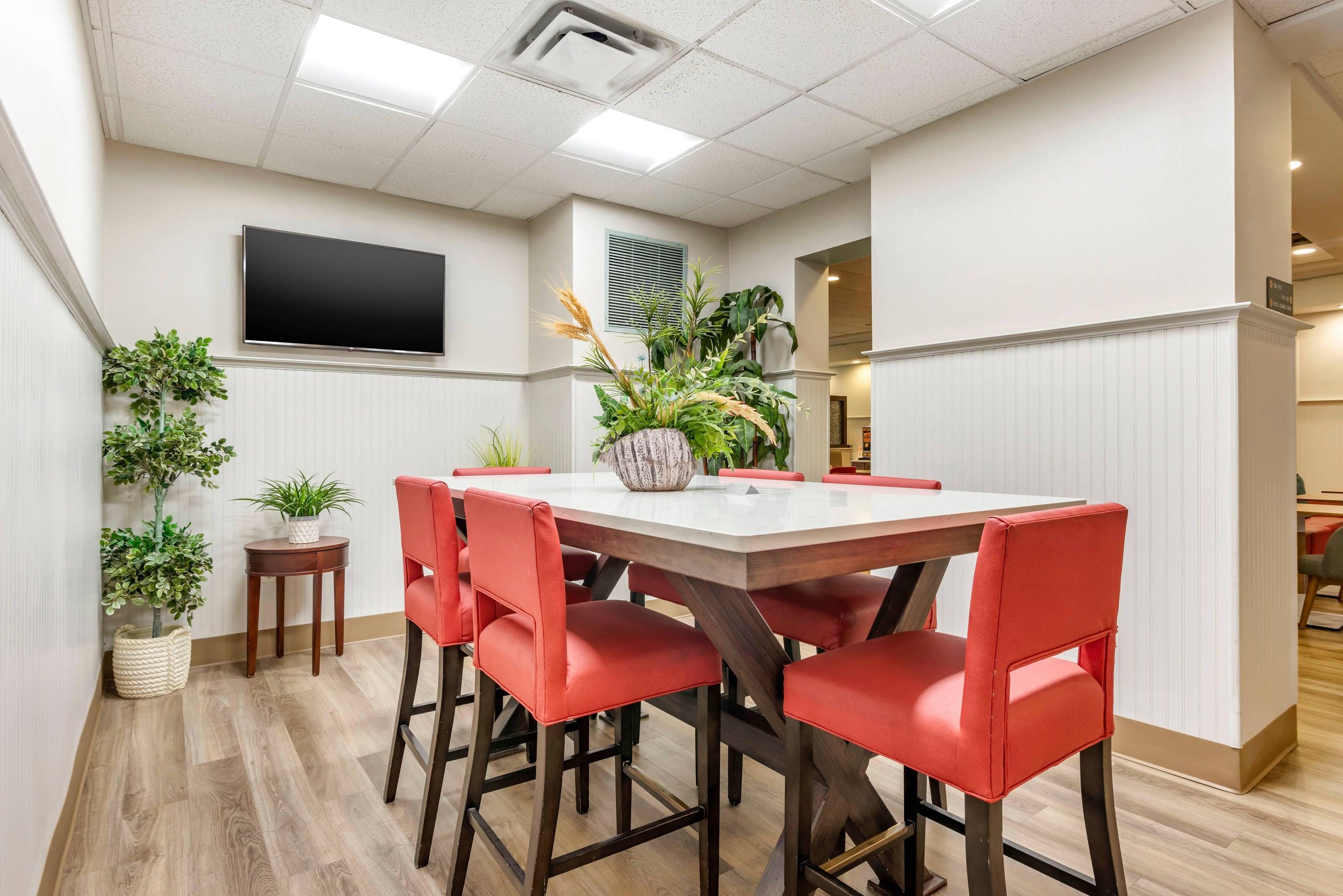 Enjoy breakfast in this seating area | Mainstay Suites Ocean City West