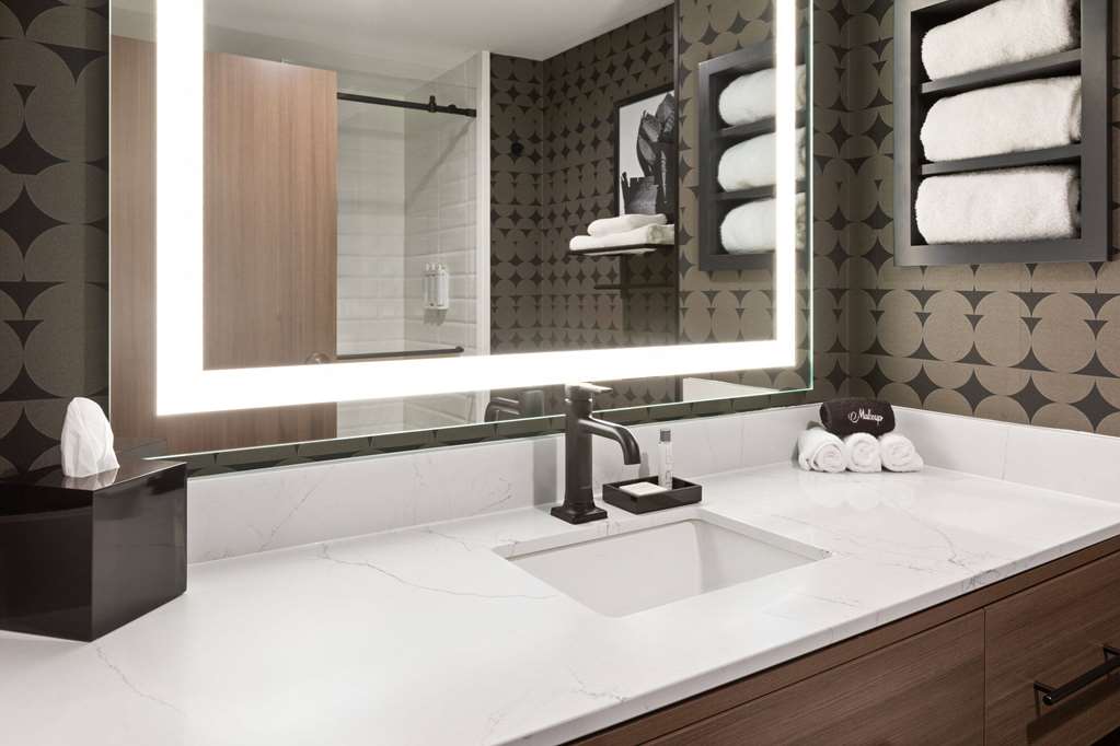 RIVERBEND HOTEL AND SUITES, TRADEMA-guestroom-Guest Room,Bathroom,On-Site.jpg