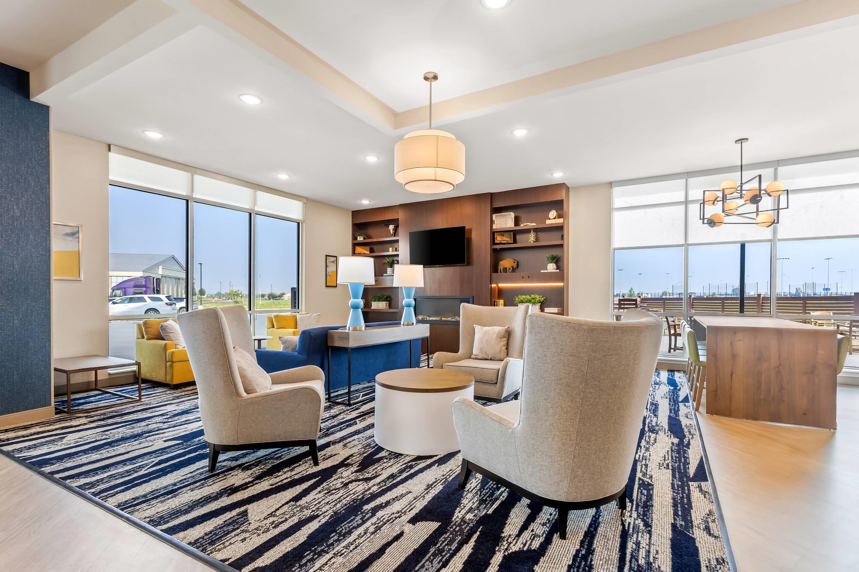 Lobby with sitting area | Comfort Inn & Suites at Sanford Sports Complex
