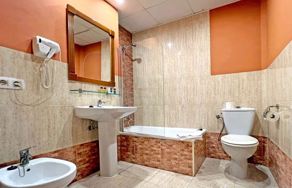MOON DREAMS FUENGIROLA-guestroom-Guest Room,Bathroom,On-Site.jpg