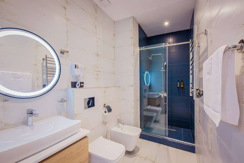 GINO SEASIDE TBILISI TRADEMARK-guestroom-Guest Room,Bathroom,On-Site.jpg
