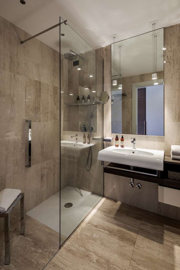 CALA CUNCHEDDI-guestroom-Guest Room,Bathroom,On-Site.jpg