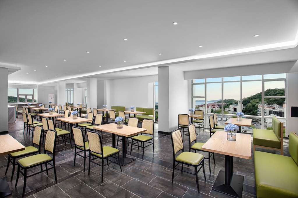 RAMADA ENCORE BY WYNDHAM QINGDAO-guestroom-Dining,Dining Area,On-Site.jpg