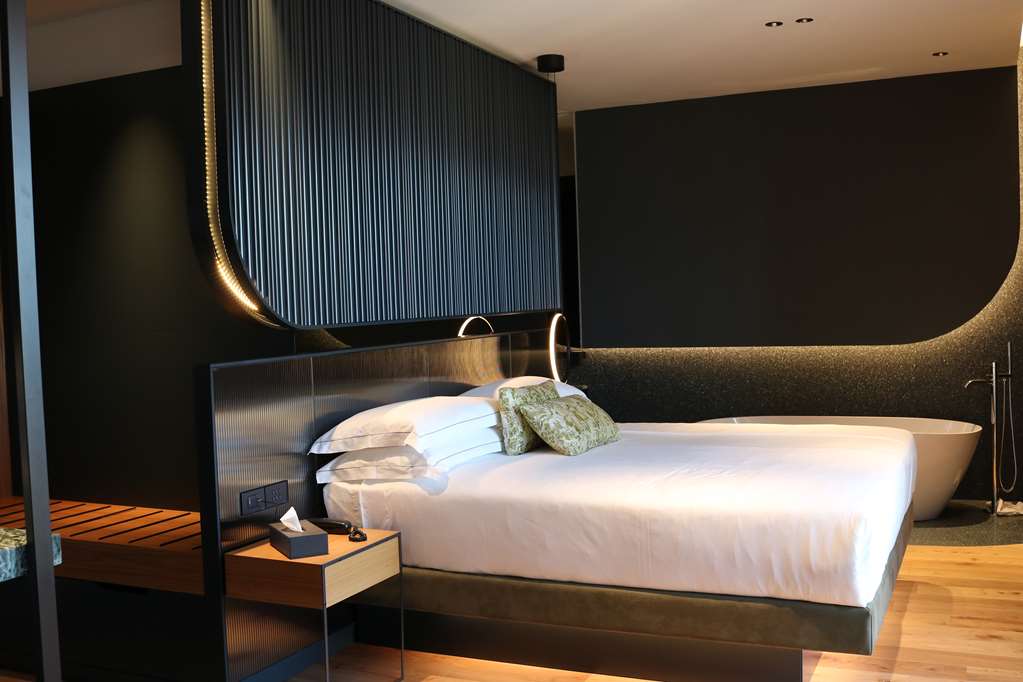 Hotel Al Caminetto WorldHotels Crafted-guestroom-Guest Room,Suite,On-Site.jpg