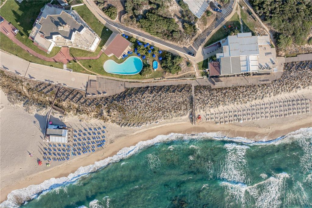 BELLEVUE RESORT SARDINIA AFFILIATED-guestroom-Guest Room,Guest Room Amenity,Pool,Architecture,Off-Site,On-Site,Outdoor/Exterior,Local Area,Beach,View from above,Exterior View of Building.jpg