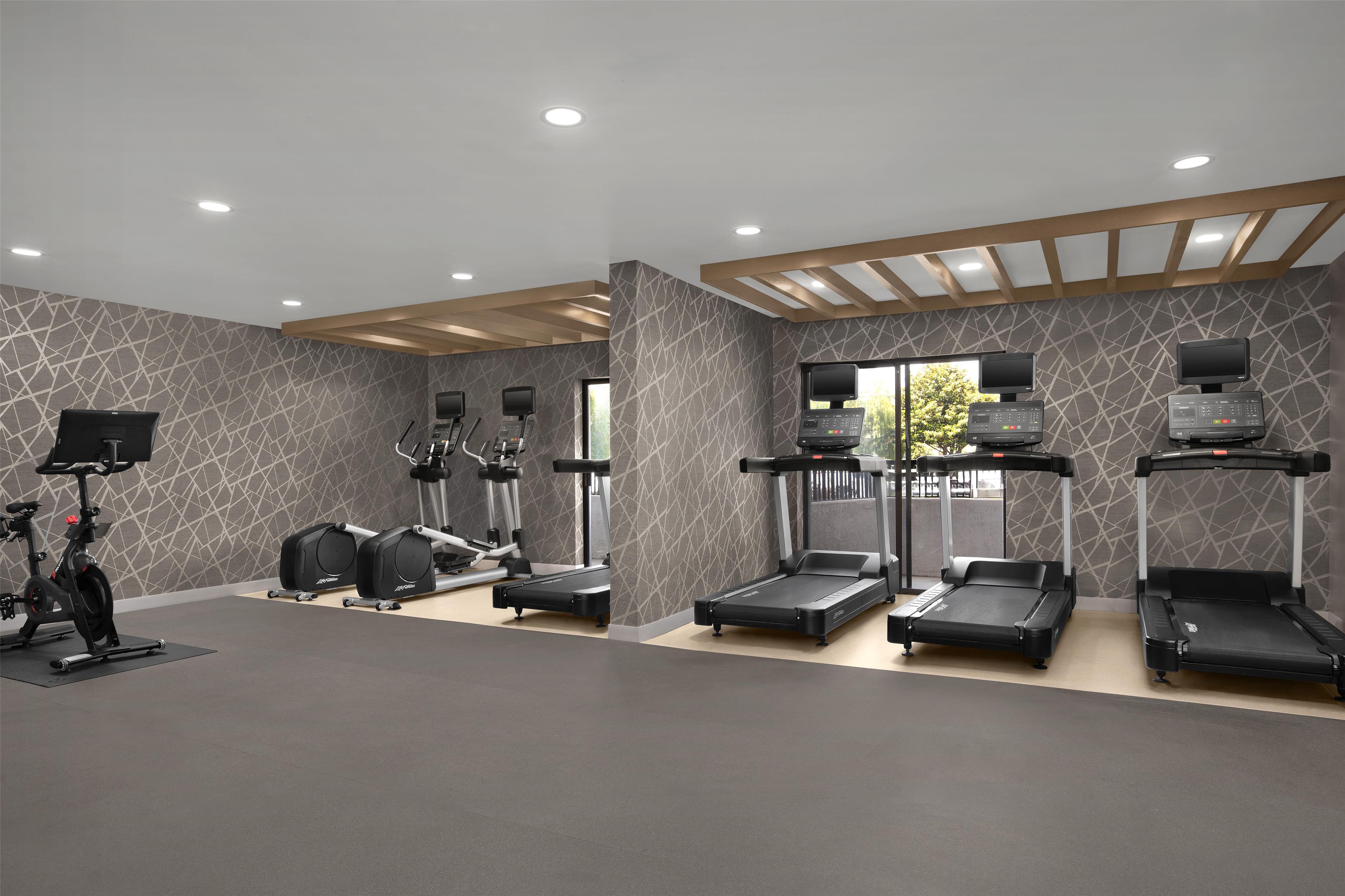 Health club fitness center gym | Homewood Suites by Hilton Santa Maria