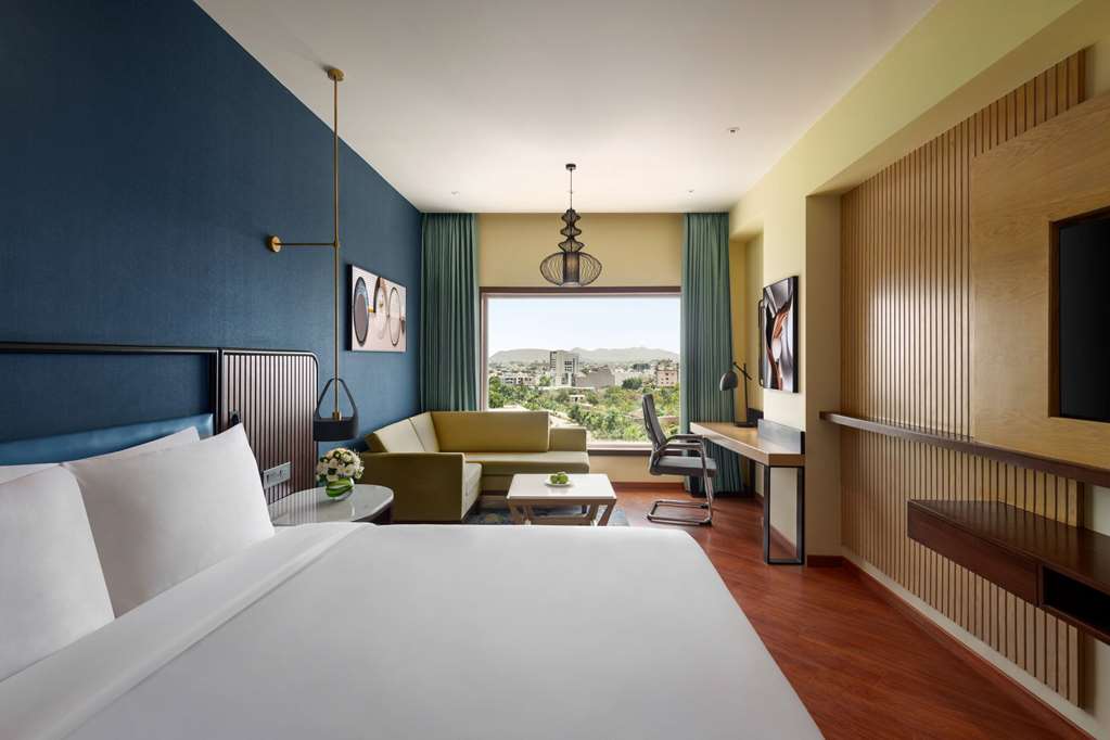 RAMADA ENCORE BY WYNDHAM UDAIPUR RO-guestroom-Guest Room,On-Site.jpg