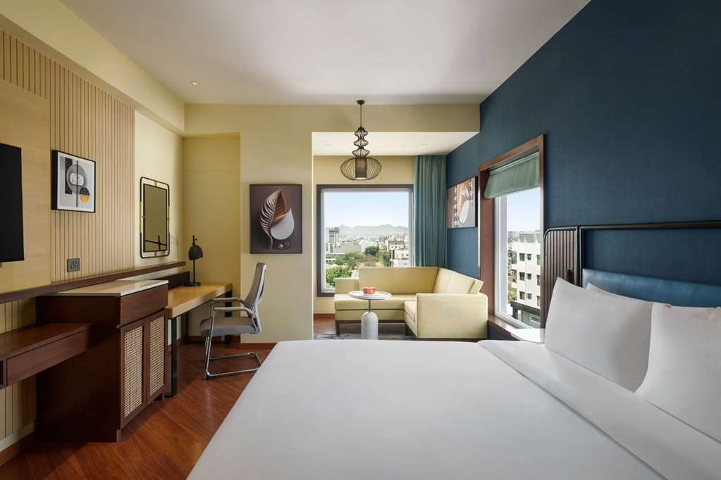 RAMADA ENCORE BY WYNDHAM UDAIPUR RO-guestroom-Guest Room,Suite,On-Site.jpg
