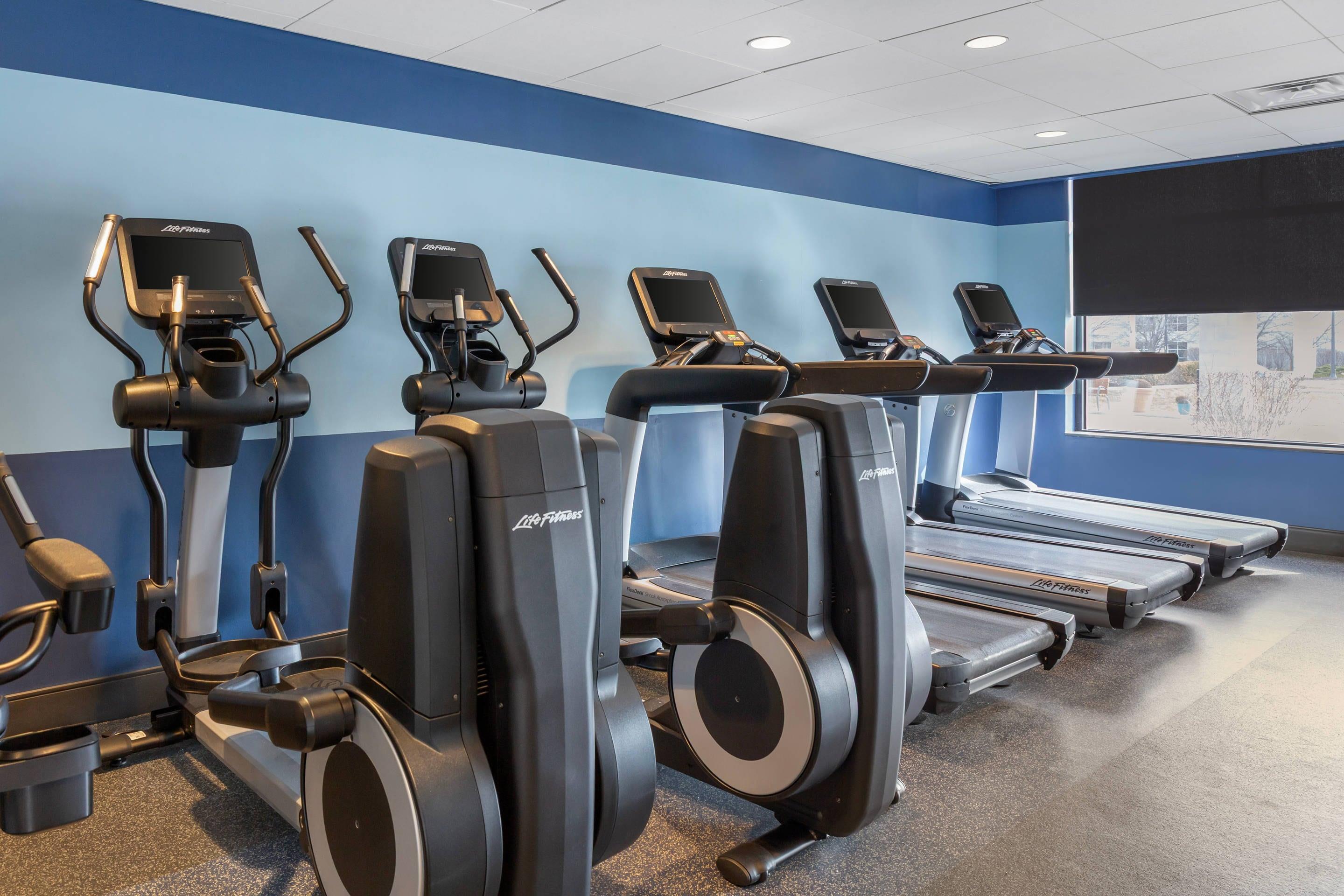 Exercise room with cardio equipment