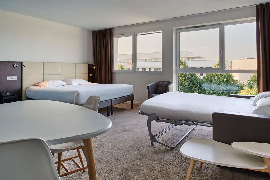 OG CITY HOTEL CAEN MEMORIAL-guestroom-Guest Room,Suite,On-Site.jpg